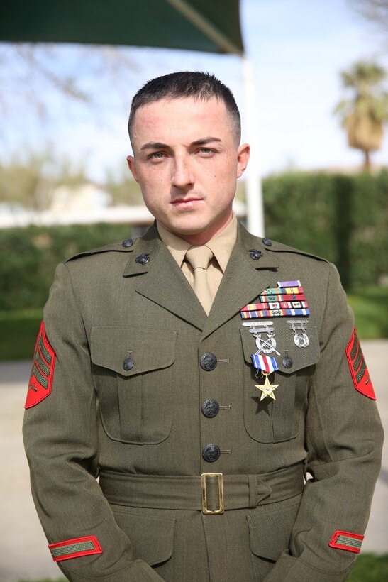 Sergeant Kenneth Rick, a squad leader with 1st Battalion, 7th Marine Regiment, received the Silver Star Medal from Lt. Gen. John Toolan, commanding general of I Marine Expeditionary Force, during an award ceremony held at Marine Corps Air Ground Combat Center Twentynine Palms, Calif., Feb. 18, 2014. Rick, a native of Sacramento, was recognized for his heroic actions in Afghanistan when he maintained a tactical advantage while being ambushed by a larger enemy force. Rick saved the lives of multiple Marines and destroyed numerous enemy positions during a six-day operation. (U.S. Marine Corps Photo by Lance Cpl. Christopher J. Moore/released)