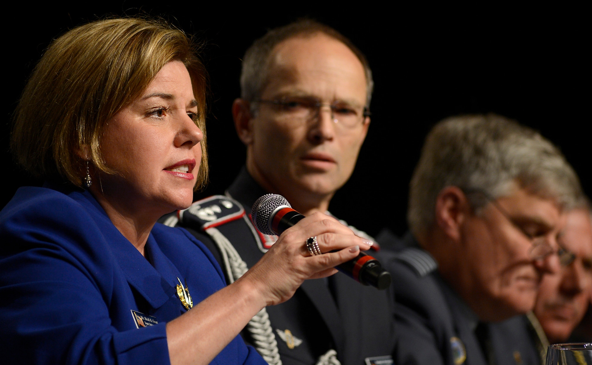 Heidi Grant begins a panel discussion, "Growing Partnerships," during the 30th Annual AFA Air Warfare Symposium and Technology Exposition, in Orlando, Fla., Feb. 20, 2014.  Grant shared the panel with attachés German Air Attaché and Assistant Defense Attaché Col. Bernhard Altensberger, Royal Netherlands air force Air and Assistant Defense Attaché Col. Anton ven Drijver, New Zealand Defense Attaché Air Vice Marshall Graham Lintott, United Kingdom Air Attaché Air Commodore Kenneth McCann and Air Force Assistant Vice Chief of Staff Lt. Gen. Stephen Hoog. Grant is the deputy assistant secretary of the Air Force, international affairs. (U.S. Air Force photo/Scott M. Ash)