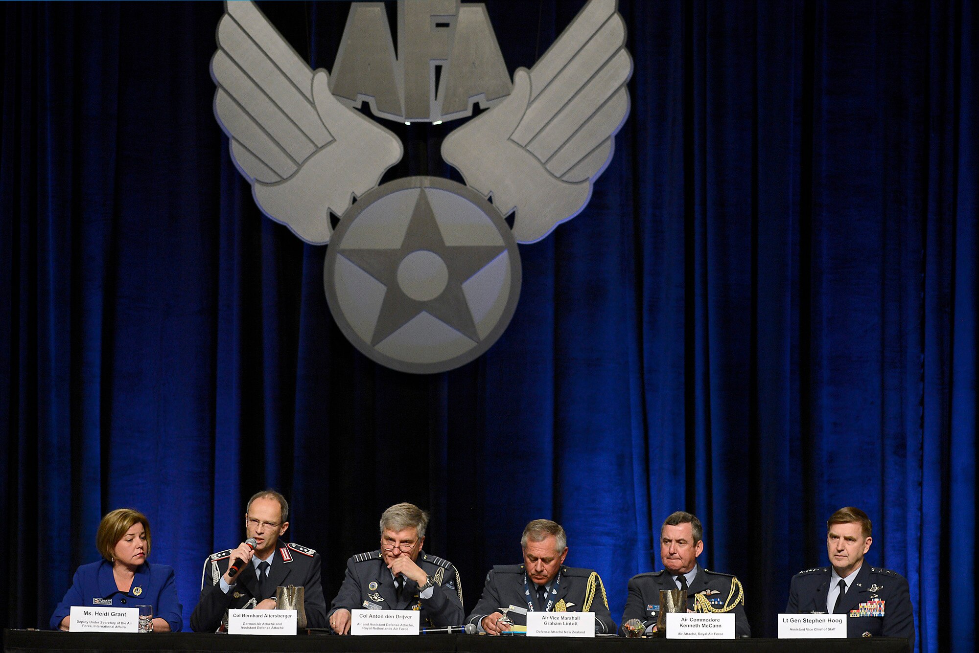 German Air Attaché and Assistant Defense Attaché Col. Bernhard Altensberger answers a question during the panel discussion, "Growing Partnerships," during the 30th Annual AFA Air Warfare Symposium and Technology Exposition, in Orlando, Fla., Feb. 20, 2014.  Altensberger shared the panel with Deputy Assistant Secretary of the Air Force, International Affairs, Heidi Grant, Royal Netherlands Air Force Air and Assistant Defense Attaché Col. Anton ven Drijver, New Zealand Defense Attaché Air Vice Marshall Graham Lintott, United Kingdom Air Attaché Air Commodore Kenneth McCann and Air Force Assistant Vice Chief of Staff Lt. Gen. Stephen Hoog.  (U.S. Air Force photo/Scott M. Ash)