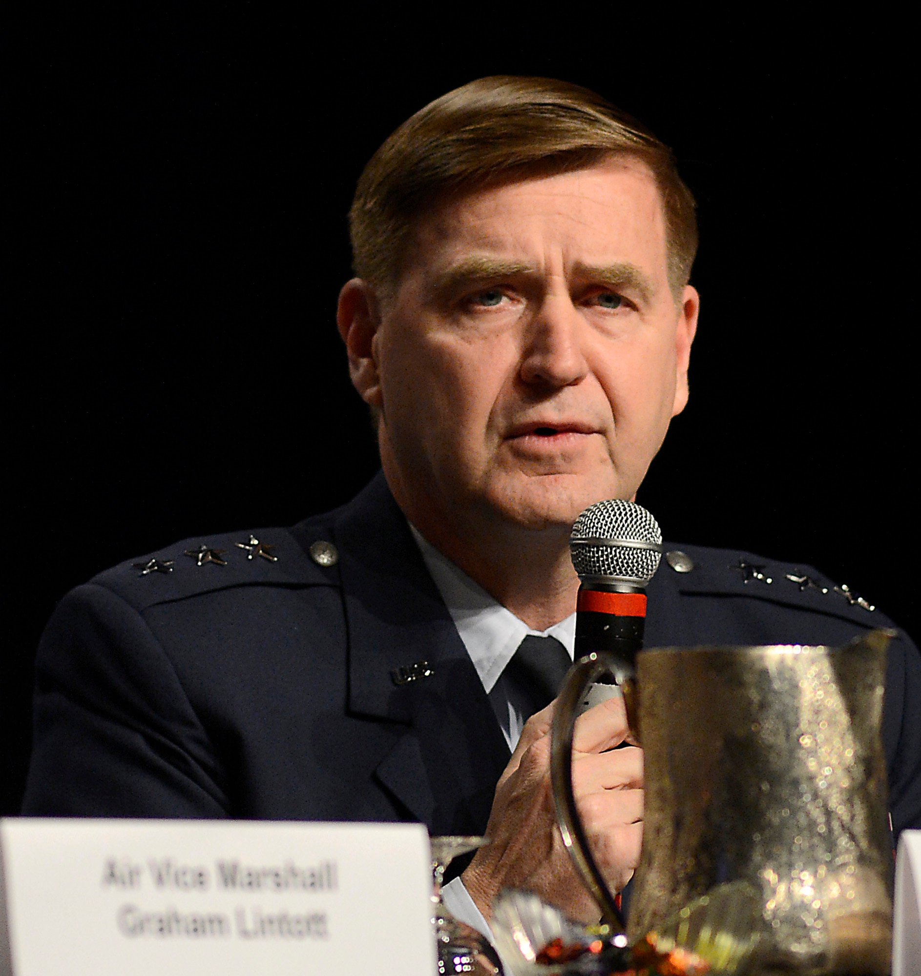 Air Force Assistant Vice Chief of Staff Lt. Gen. Stephen Hoog answers a question during the panel discussion, "Growing Partnerships," during the 30th Annual AFA Air Warfare Symposium and Technology Exposition, in Orlando, Fla., Feb. 20, 2014.  Hoog shared the panel with Deputy Assistant Secretary of the Air Force, International Affairs, Heidi Grant, German Air Attaché and Assistant Defense Attaché Col. Bernhard Altensberger, Royal Netherlands Air Force Air and Assistant Defense Attaché Col. Anton ven Drijver, New Zealand Defense Attaché Air Vice Marshall Graham Lintott and United Kingdom Air Attaché Air Commodore Kenneth McCann. (U.S. Air Force photo/Scott M. Ash)