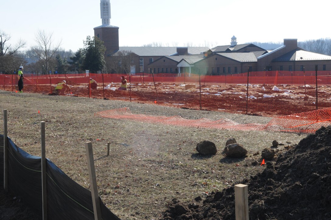 Workers prepare the grounds outside the Marine Memorial Chapel for a new home for Legal Services Support Section on Feb. 11, 2014. 