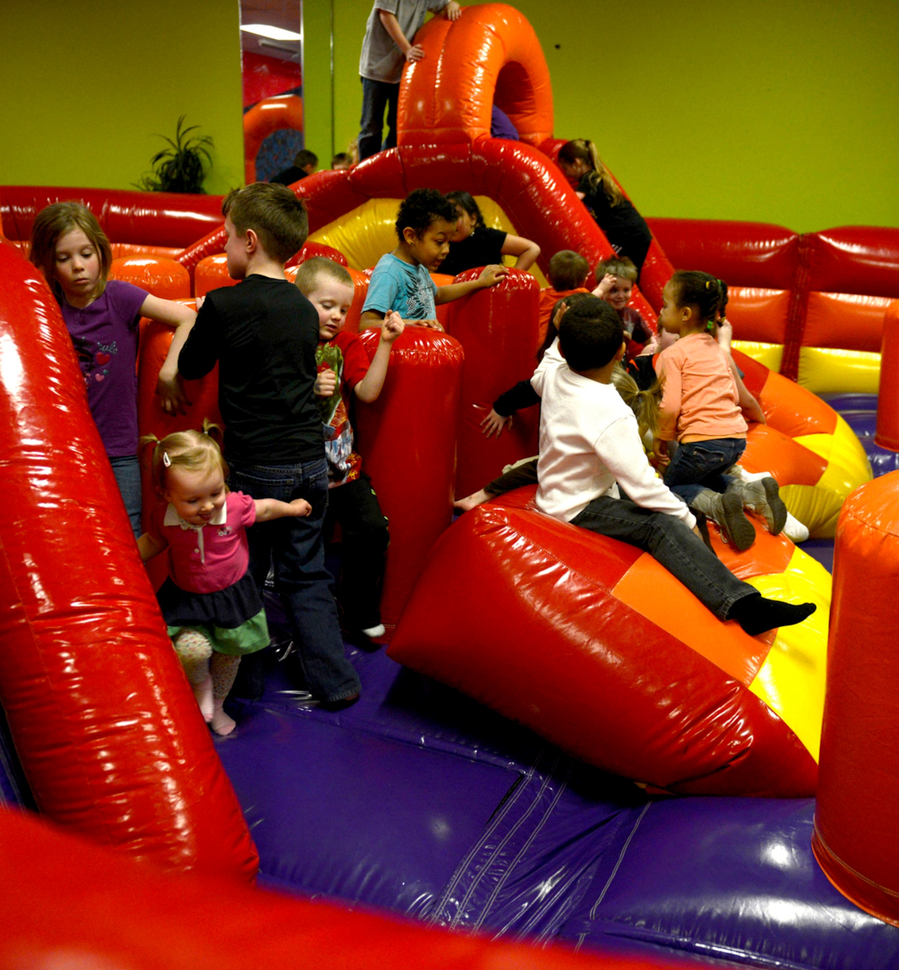 Children enjoy the bouncy house at the Arctic Oasis on Joint Base Elmendorf-Richardson March 14, 2013, during spring break. The Arctic Oasis is available to all JBER community members and their children. (U.S. Air Force photo/Airman 1st Class Tammie Ramsouer)
