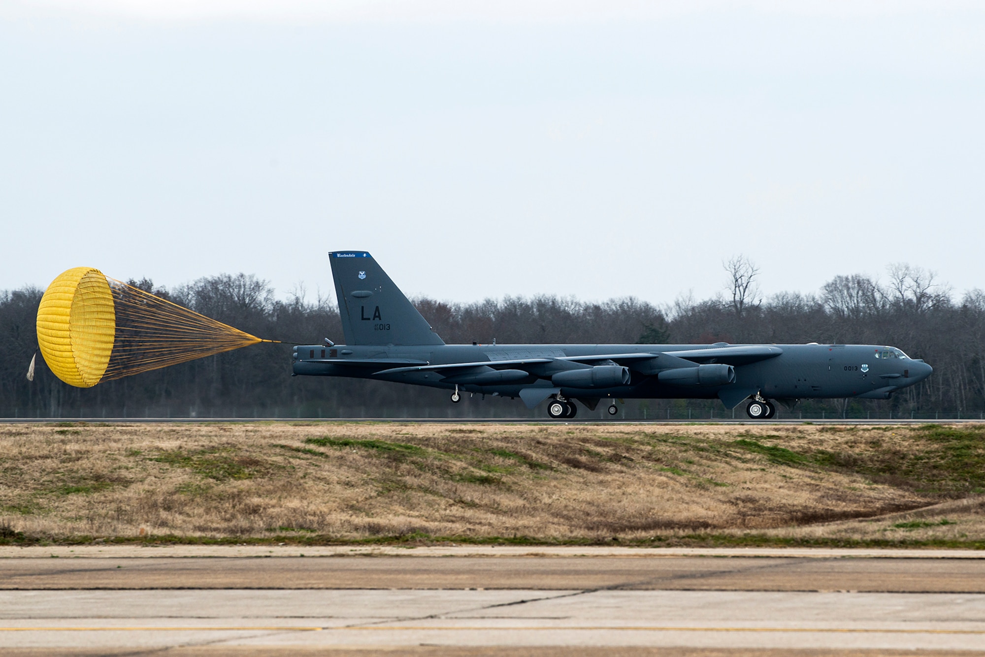 A B-52H Stratofortress assigned to the 2nd Bomb Wing, returns from a record setting mission, Feb. 18, 2014, Barksdale Air Force Base, La. The aircraft was one of two B-52s that participated in the mission, each carrying a 10 man aircrew with a total of more than 100,000 flying hours. (U.S. Air Force photo by Master Sgt. Greg Steele/Released)