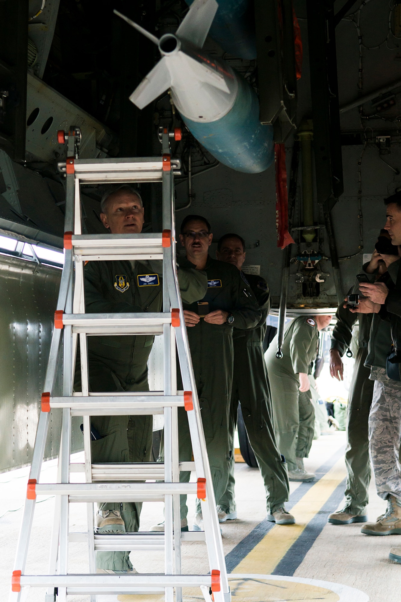 U.S. Air Force Col. Joseph Jones, 307th Bomb Wing vice commander, performs a preflight inspection on an inert 500 pound general purpose bomb prior to a mission in a B-52H Stratofortress, Feb. 18, 2014, Barksdale Air Force Base, La. The mission consisted of two B-52s flown by aircrew totaling over 100,000 flying hours in the aircraft. (U.S. Air Force photo by Maj. Kevin Smith/Released)