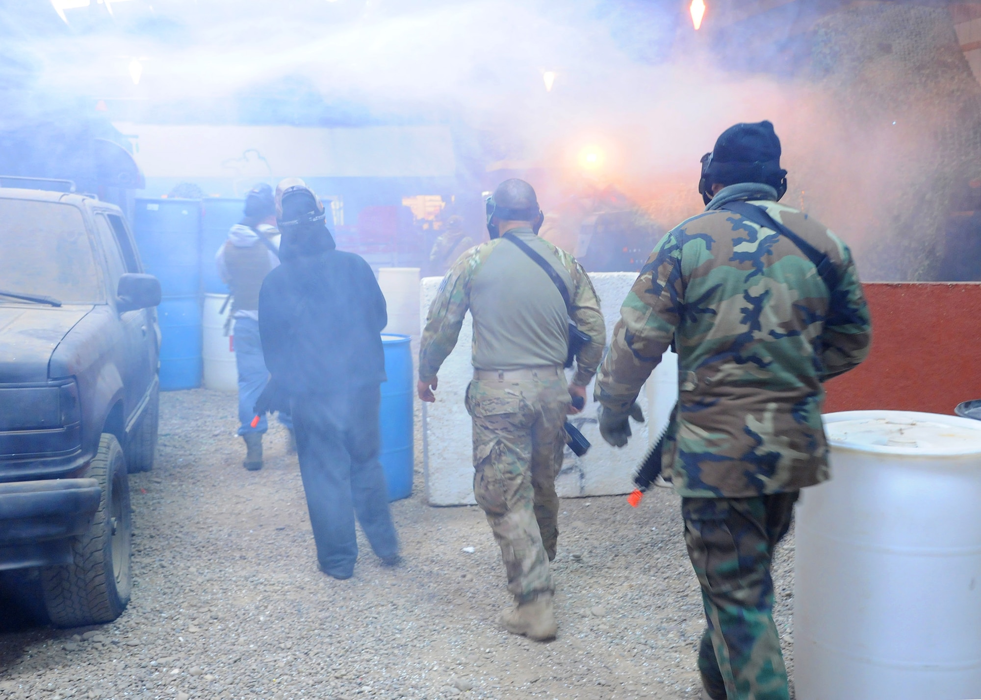 Members of Malmstrom’s 341st Civil Engineer Squadron Emergency Management team walk out of an airsoft range after being defeated by the Explosive Ordnance Disposal team members during a match at the Electric City Airsoft range Feb. 14. From left to right are Senior Airman Thomas Hermansen, 341st Civil Engineer Squadron emergency management technician, Senior Airman Der Her, 341st CES emergency management technician, Airman 1st Class Lance Pares, 341st CES EOD technician, and Master Sgt. Daniel Raimondo, 341st CES emergency management technician. (U.S. Air Force photo/Senior Airman Cortney Paxton)