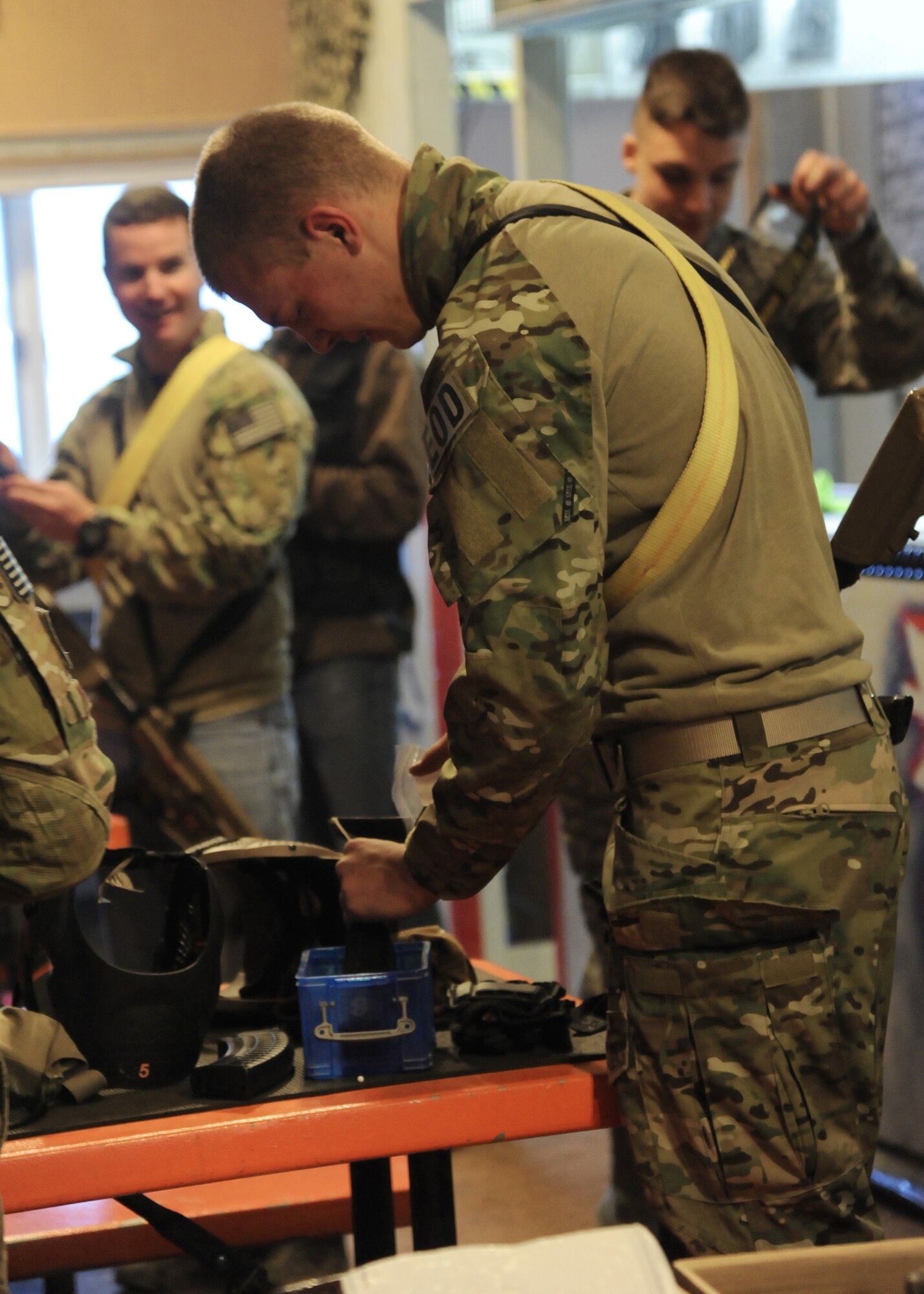 Airman 1st Class Richard Emery II, 341st Civil Engineer Squadron Explosive Ordnance Disposal technician, refills the ammunition for his airsoft gun at the Electric City Airsoft range Feb. 14. Malmstrom’s EOD team along with a few emergency management members gathered at the airsoft range for some tactical training and morale building throughout the team. (U.S. Air Force photo/Senior Airman Cortney Paxton)