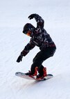 Austin Murray, a Malmstrom dependent, snowboards down one of Showdown Ski Resort’s blue slopes, which is moderately difficult, Feb. 13. Showdown offers skiers and snowboarders many slopes with different difficulty levels ranging from beginner to expert level. (U.S. Air Force photo/Airman 1st Class Collin Schmidt) 