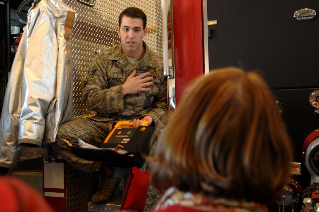 Senior Airman Anthony Delvecchio, 319th Civil Engineer Squadron firefighter, gives a tour of the base fire station to students and faculty from four local high schools Feb. 18, 2014, on Grand Forks Air Force Base, N.D. More than three dozen students visited the base to learn about possible careers in the military in observance of National Job Shadow Month. (U.S. Air Force photo/Staff Sgt. Susan L. Davis)