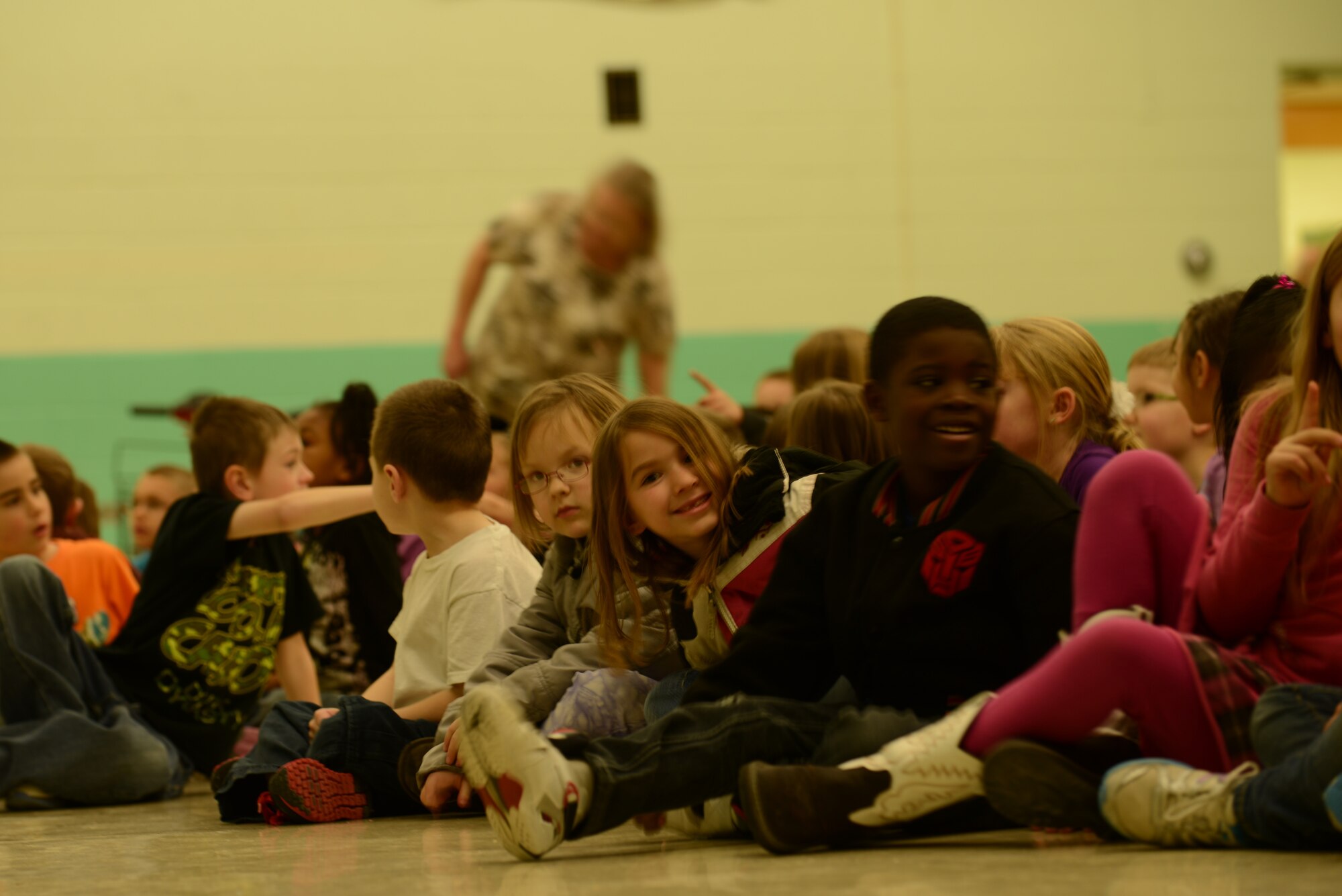 Nearly every child from the Mountain Home Air Force Base primary school gathered for a presentation Feb. 19, 2014, at Mountain Home Air Force Base, Idaho. Each February, the American Dental Association sponsors National Children's Dental Health Month to raise awareness about the importance of oral health. (U.S. Air Force photo by Senior Airman Benjamin Sutton/Released)  