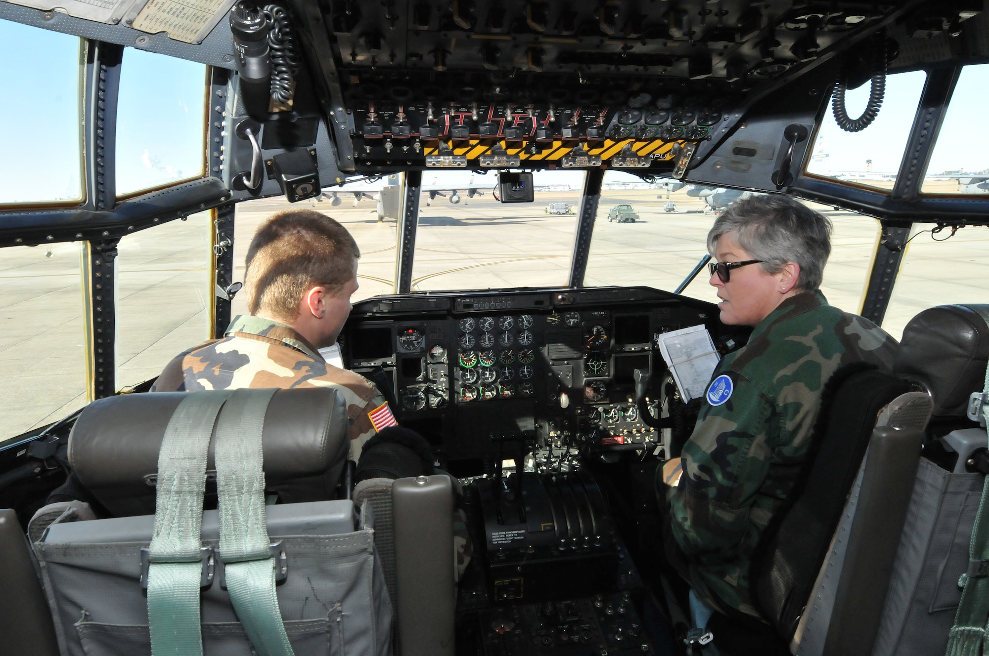 Maj. Dana Glenn, commander of Gastonia Composite Squadron, NC 024, North Carolina Wing Civil Air Patrol and cadet Kenton D. Brown, take a pilot’s view on board a 145th Airlift Wing, C-130 Hercules aircraft during a tour at the North Carolina Air Nation Guard base, Charlotte Douglas Intl. airport, January 22, 2014.  Providing tours to these cadets is one way the NCANG gives back to the community by providing students an opportunity to see firsthand the importance of the sacrifices that have been made in the past, and what it takes to continue to do well in the future.  (U.S. Air National Guard photo by Master Sgt. Patricia F. Moran/Released)