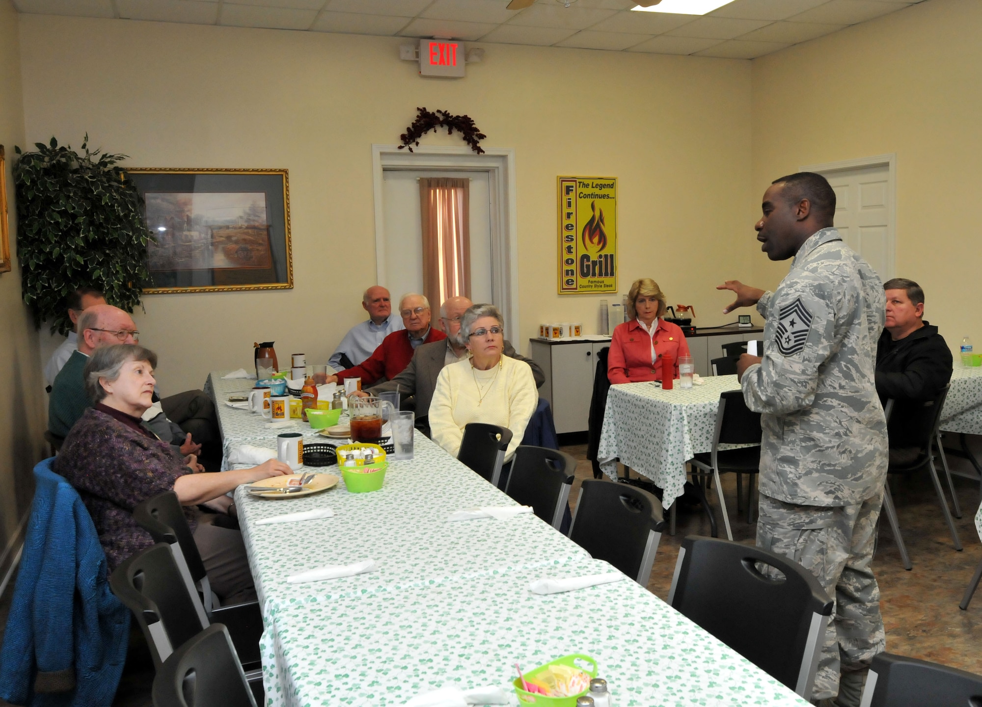 U.S. Air Force Command Chief Master Sgt. Maurice Williams, 145th Airlift Wing, talks with business leaders and local government officials during a meeting held by the Gastonia Optimist Club in Gastonia, N.C.  Williams took the opportunity to share the history of the North Carolina Air National Guard and to inform the members of current missions that the NCANG supports. There are 1500 airmen in the NCANG ready to respond to the needs of the community, to serve and protect our state and nation. (U.S. Air National Guard photo by Master Sgt. Patricia F. Moran/Released)