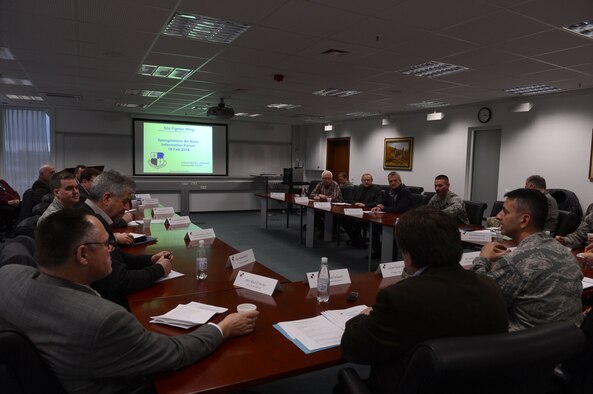 Leadership from the 52nd Fighter Wing and German community leaders discuss new developments at Spangdahlem Air Base during an information forum at Spangdahlem Air Base, Germany, Feb. 19, 2014. The information forum allowed key leaders from the German community to address the happenings of Spangdahlem Air Base and potential issues in efforts to strengthen community ties. (U.S. Air Force photo by Airman 1st Class Kyle Gese/Released)