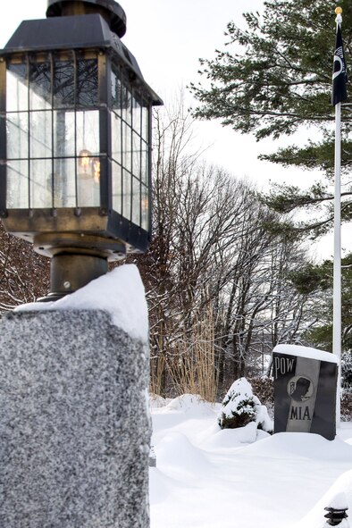 HANSCOM AIR FORCE BASE, Mass. – Several inches of new snow accumulates around the POW/MIA memorial on Barksdale Street here Feb. 19. The base and surrounding communities saw several more inches of snow this week as a result of the middle of the week snowstorm. (U.S. Air Force photo by Rick Berry)