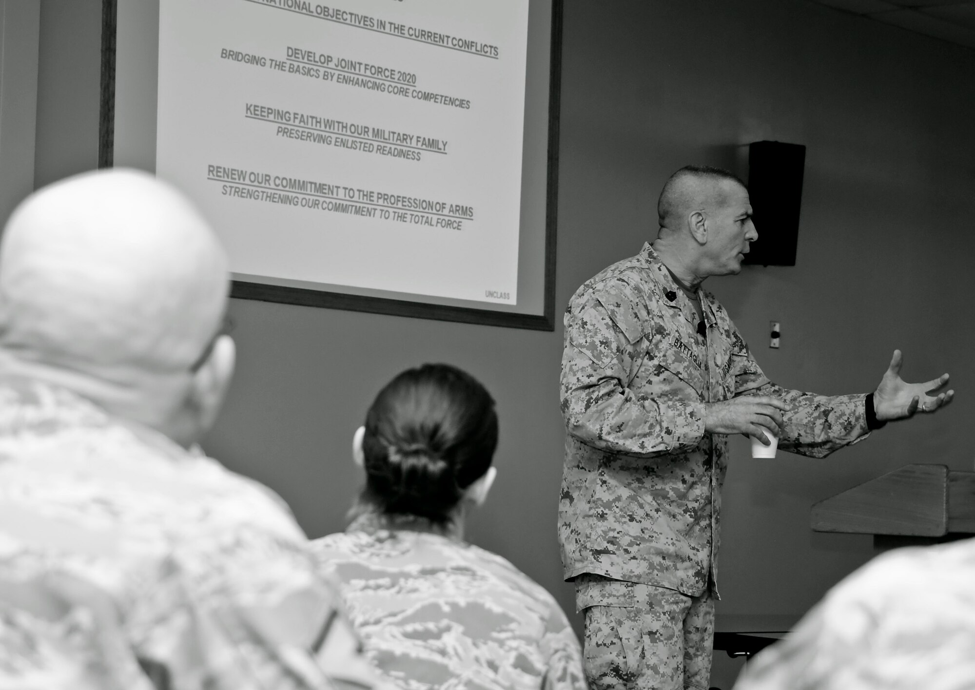 U.S. Marine Sgt. Maj. Bryan Battaglia, the senior non-commissioned officer of the U.S. Armed Forces, speaks to Illinois soldiers and airmen at the 182nd Airlift Wing in Peoria, Ill., April 6, 2013. The photo was one of five by Staff Sgt. Lealan C. Buehrer, photojournalist with the 182nd Airlift Wing, submitted to the National Guard Bureau media contest. Buehrer was announced the winner of the Air National Guard Outstanding New Photographer category on Feb. 3, 2014. (U.S. Air National Guard photo by Staff Sgt. Lealan Buehrer/Released)
