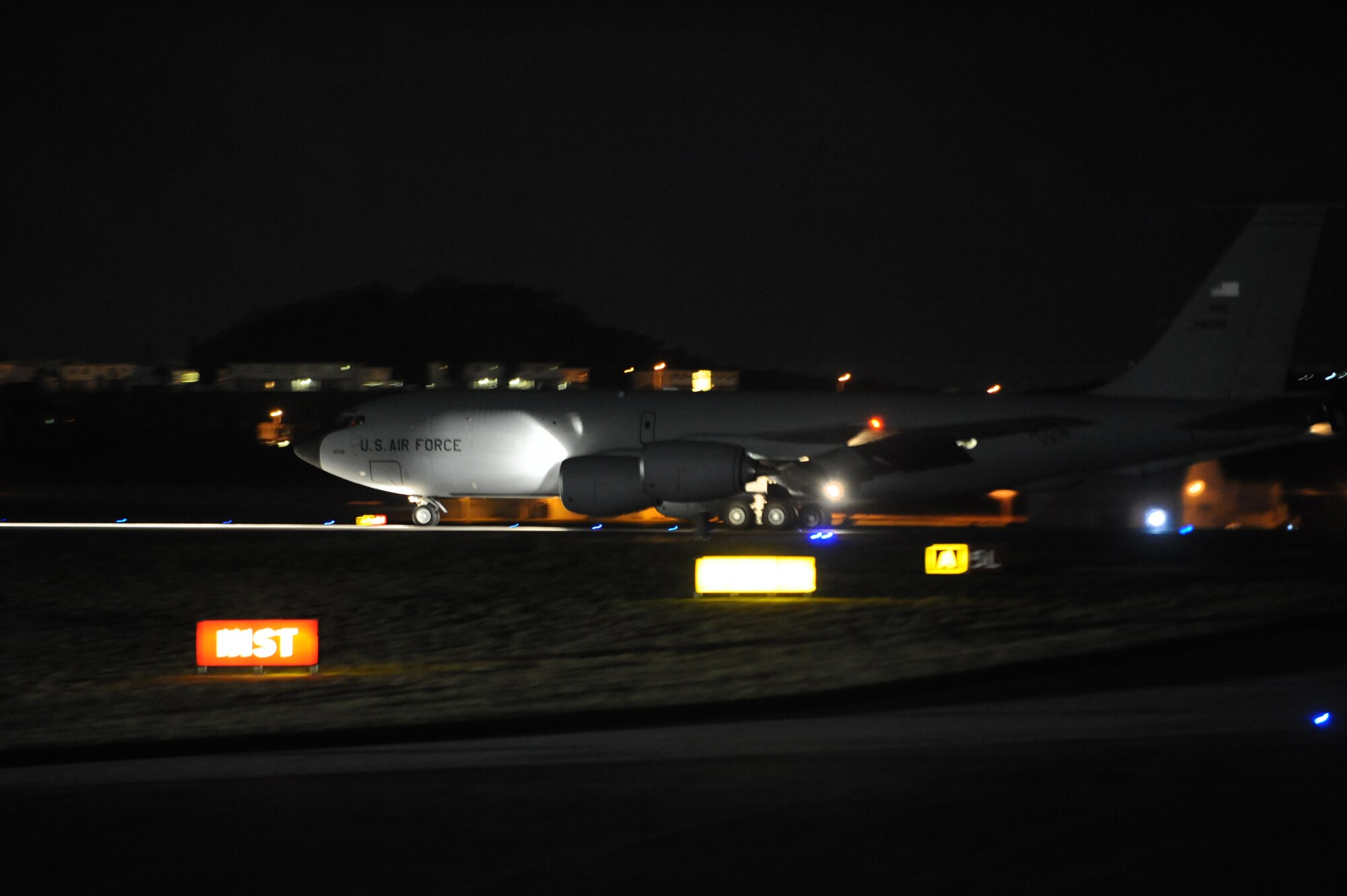 A U.S. Air Force KC-135 Stratotanker taxis down a runway on Kadena Air Base, Japan, Feb. 15, 2014. The Stratotanker was one of six to launch from the base in support of Exercise Cobra Gold. Cobra Gold is a recurring multinational and multiservice exercise hosted annually by the Kingdom of Thailand and developed by the Thai and U.S. militaries, scheduled to be held Feb. 11-21, 2014. (U.S. Air Force photo by Staff Sgt. Amber E. N. Jacobs)