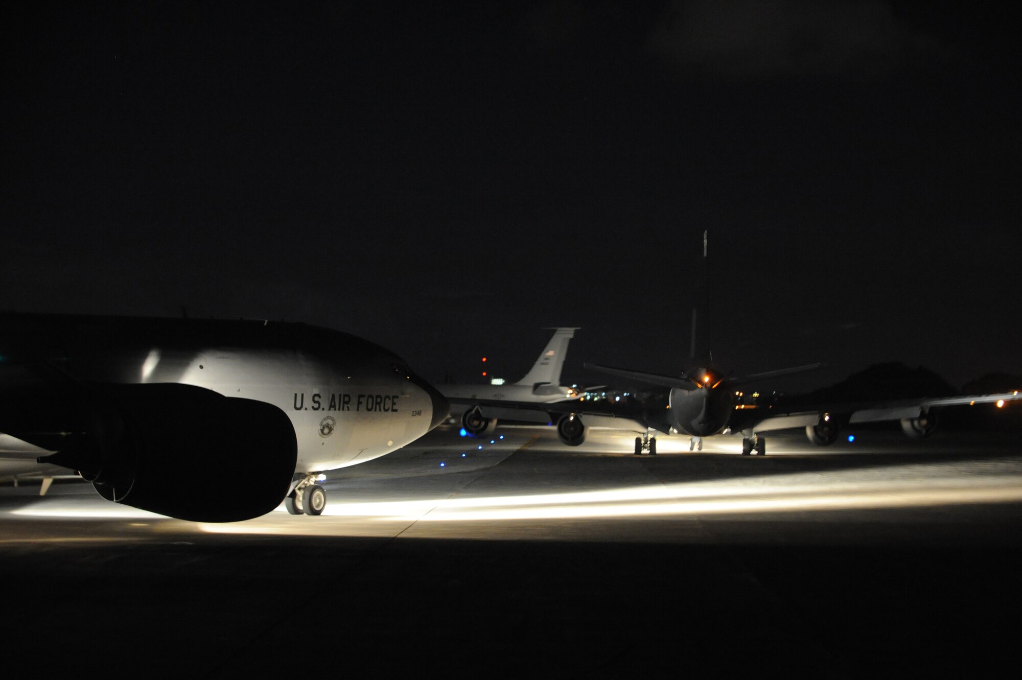 Three U.S. Air Force KC-135 Stratotankers from McConnell Air Force Base, Kansas, Joint Base Pearl Harbor-Hickam, Hawaii and Kadena Air Base taxi down a runway on Kadena Air Base, Japan, Feb. 15, 2014. The Stratotankers supported Exercise Cobra Gold by refueling five C-17 Globemasters III headed to Thailand. Cobra Gold is a recurring multinational and multiservice exercise hosted annually by the Kingdom of Thailand and developed by the Thai and U.S. militaries, scheduled to be held Feb. 11-21, 2014. (U.S. Air Force photo by Staff Sgt. Amber E. N. Jacobs)