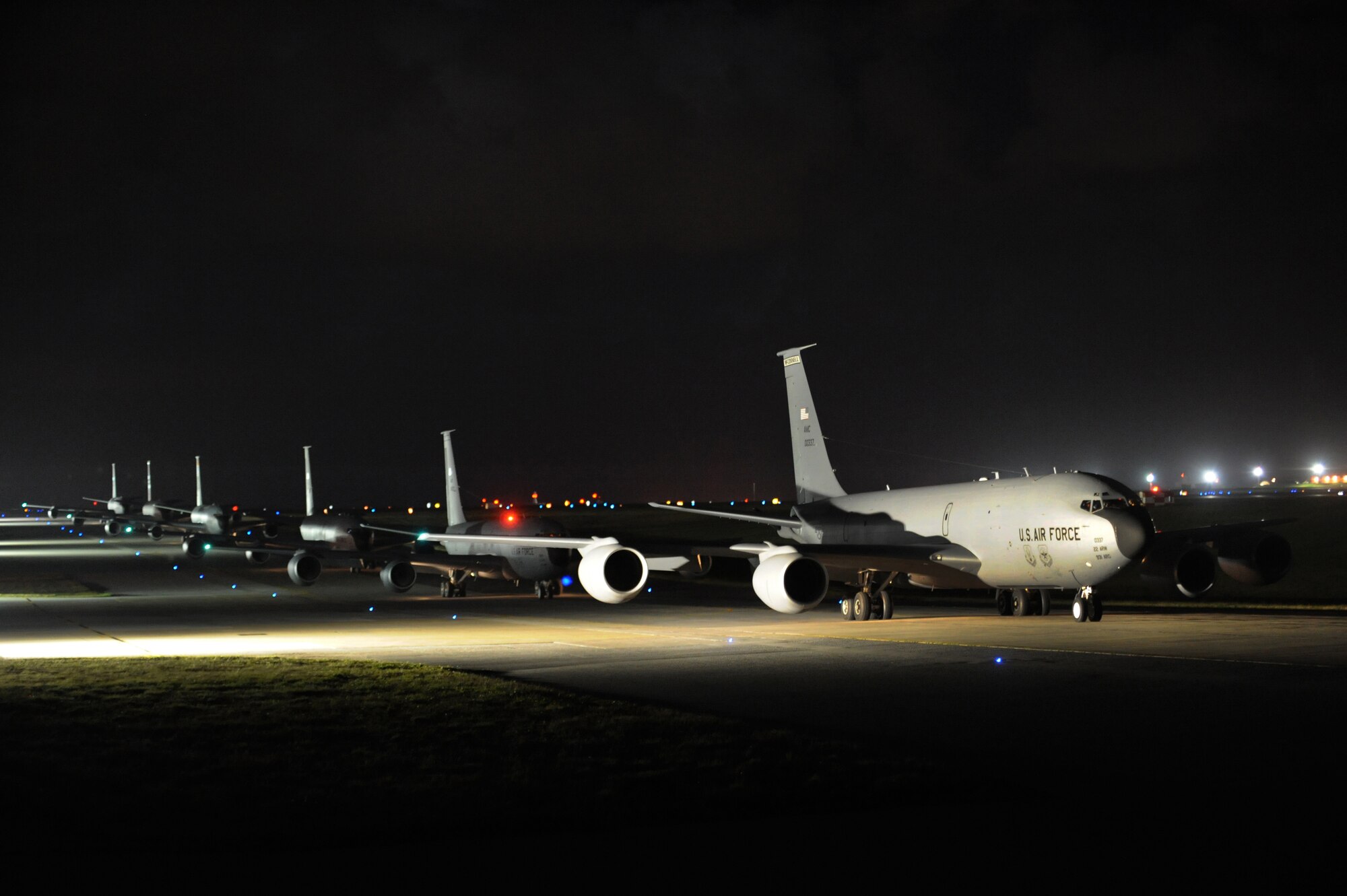 Six U.S. Air Force KC-135 Stratotankers from McConnell Air Force Base, Kansas, Joint Base Pearl Harbor-Hickam, Hawaii and Kadena Air Base taxi down a runway on Kadena Air Base, Japan, Feb. 15, 2014. The Stratotankers supported Exercise Cobra Gold by refueling five C-17 Globemasters III headed to Thailand. Cobra Gold is a recurring multinational and multiservice exercise hosted annually by the Kingdom of Thailand and developed by the Thai and U.S. militaries, scheduled to be held Feb. 11-21, 2014. (U.S. Air Force photo by Staff Sgt. Amber E. N. Jacobs)
