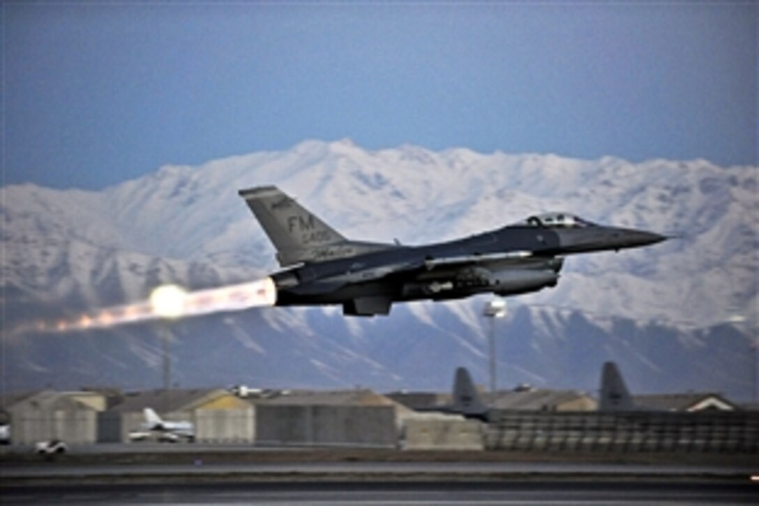 A U.S. Air Force F-16 Fighting Falcon takes off on a mission at dawn from Bagram Airfield, Afghanistan, Feb. 11, 2014. The aircraft and crews at Bagram are prepared to fly 24 hours a day. 