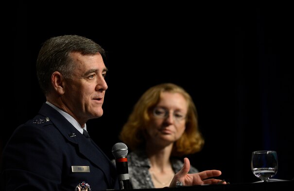 Lt. Gen. Burton Field and Dr. Rebecca Grant talk about new capabilities during their, "The Future Bomber," discussion at the 30th Annual Air Force Association Air Warfare Symposium and Technology Exposition Feb. 20, 2014, in Orlando, Fla. Field said as the technological climate of war advances, the new long-range strike bomber will need the capability to combat new threats. Field is the deputy chief of staff for operations, plans and requirements and Grant is the president of IRIS Independent Research. (U.S. Air Force photo/Scott M. Ash)
