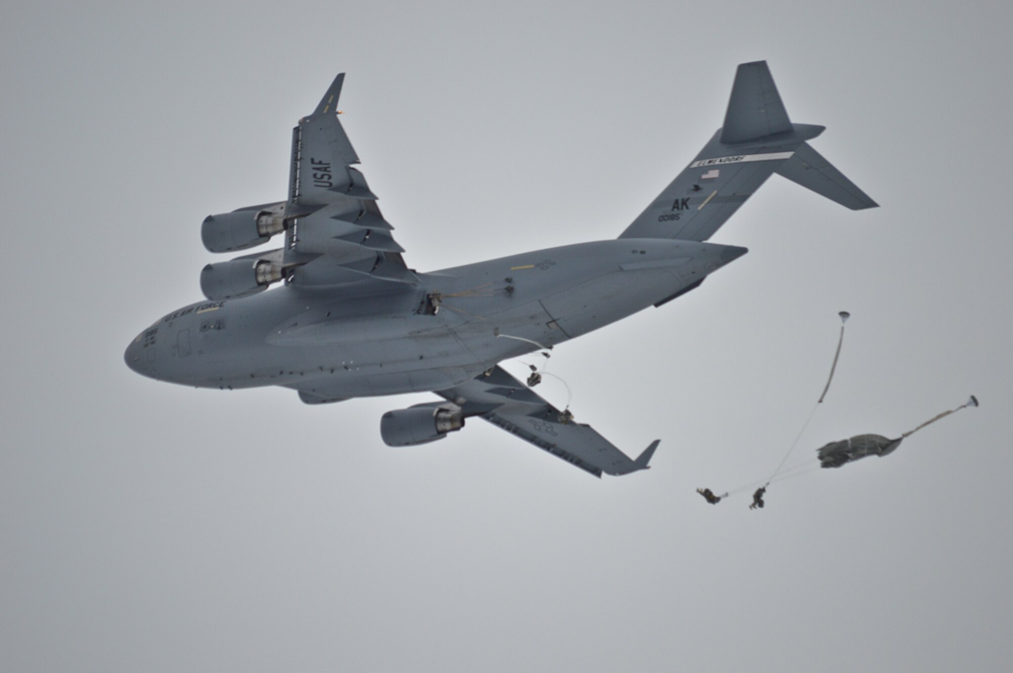 Paratroopers from the 4/25th IBCT jump from a C-17 Globemaster III Feb. 17, 2014, into Malemute Drop Zone at Lop Buri, Kingdom of Thailand, as part of Exercise Cobra Gold.  Cobra Gold, an annual exercise providing tactical, humanitarian and civil assistance, brings together multiple nations cooperating in areas of common interest to support the security and stability of the Asia-Pacific region. (Courtesy photo)