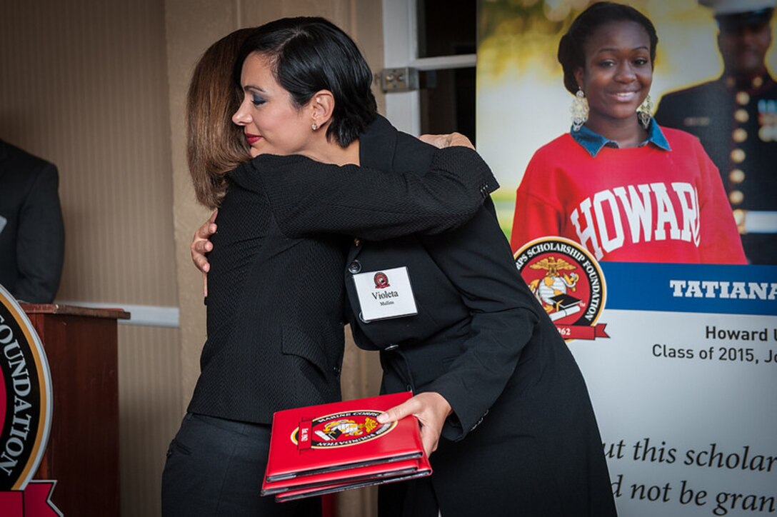 The Marine Corps Scholarship Foundation pledged $30,000 in scholarships to the seven children of fallen Marines Feb. 21 in Washington. The four explosive ordnance disposal technicians died from a blast during a range maintenance operation November 2013 Camp Pendleton, Calif. The foundation created the Explosive Ordnance Disposal Marine Memorial Scholarship in memory of these Marines.