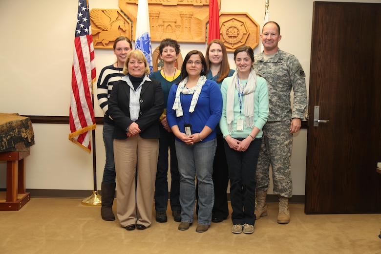 Louisville District regulators are awarded for teaching classes at Presentation Academy in wetlands and stream-related ecology. (Rear) Left to right Leslie Estill, Patti Grace-Jarrett, Kimberly Simpson, Col. Luke Leonard; (Front) Left to right Jane Archer, Jennifer Thomason, Meagan Chapman.
