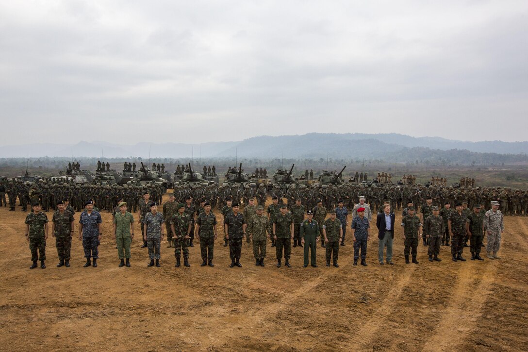 Multinational dignataries, representing the participating nations of exercise Cobra Gold 2014, pose for a group photograph after the conlusion of a combined live-fire exercise that marked the end of the exercise at Royal Thai Navy Tactical Training Center Ban Chan Krem, Chantaburi, Kingdom of Thailand, Feb. 21. Cobra Gold, in its 33rd iteration, demonstrates the U.S. and the Kingdom of Thailand's commitment to our long-standing alliance and regional partnership, prosperity and security in the Asia-Pacific region.