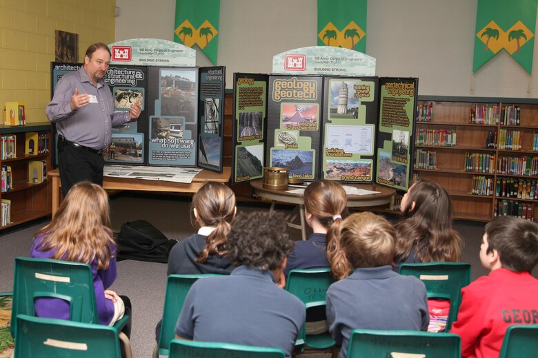 SAVANNAH, Ga. – As part of National Engineers Week, members of the U.S. Army Corps of Engineers visited May Howard Elementary school to talk to about 70 students about science and engineering. Phil Smith (pictured), Bryan Robinson, 1st Lt. Bradley Hannon, 1st Lt. Thomas Page and 1st Lt. Chet Kraft talked about careers in geotechnical engineering, structural engineering, architecture, hydrology, natural resource management, and mechanical and electrical engineering. National Engineers Week is a nationwide observance focused on increasing public dialogue about the need for engineers and celebrating how engineers make a difference in the world. USACE photo by George Jumara.