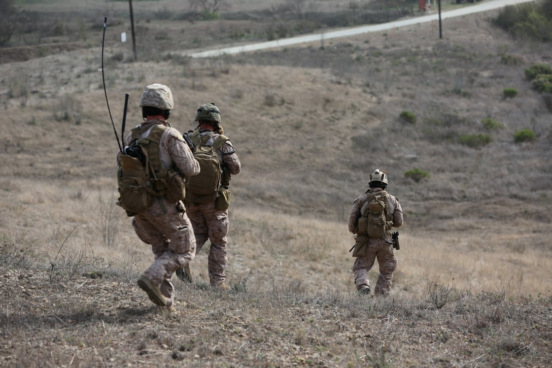 Marines from 2nd Battalion 1st Marines ex-filtrate to the bottom of a hill to extract out aboard a CH-53 Sea Stallion heavy-lift transport helicopter. I Marine Expeditionary Force Special Operations Training Group, special missions branch, facilitated an event for Marines in support of the 11th Marine Expeditionary Unit with a combined arms raid aboard Camp Pendleton, Calif., Feb. 20.