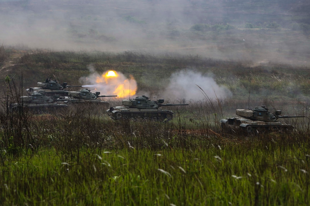 A Royal Thai M60A1 battle tank fires its main gun during a combined arms live-fire exercise as part of exercise Cobra Gold in Training Center Ban Chan Krem, Kingdom of Thailand, Feb. 21. Cobra Gold, in its 33rd iteration, demonstrates the Kingdom of Thailand, U.S. and other participating nations' commitment to regional partnerships, prosperity and security in the Asia-Pacific region. The field exercise which consisted of Royal Thai, Republic of Korea, and U.S. Marine infantry, mechanized infantry, and air assests to demonstrate unique capabilities of a multinational force.