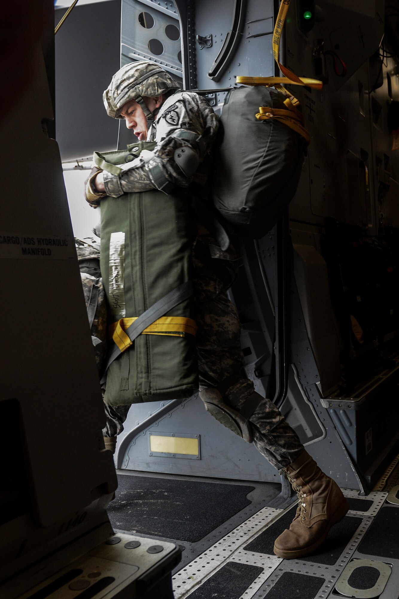 A Paratrooper from the 4th Infantry Brigade Combat Team (Airborne), 25th Infantry Division jumps into Lop Buri, Thailand for Operation Cobra Gold 2014, Jan. 15, 2014. CG14, in its 33rd iteration, demonstrates the U.S. and the Kingdom of Thailand's commitment to their long-standing alliance and regional partnership, prosperity and security in the Asia-Pacific region. (U.S. Air Force photo/Tech. Sgt. Sean Tobin)