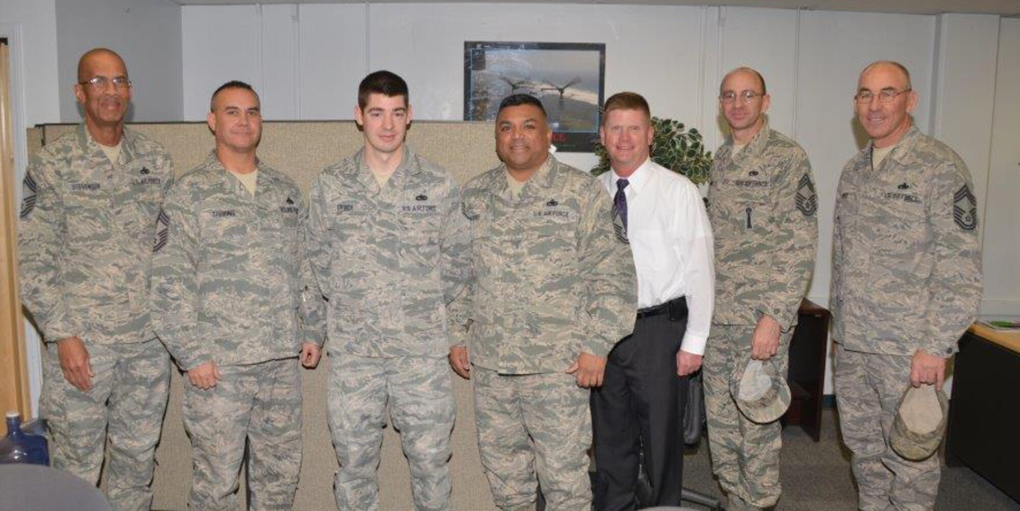 Staff Sgt. Bennett Orwix (third from left), 58th Maintenance Group, was the recipient of the December 2013 Sharp Troop Award. Orwix was nominated for outstanding professionalism and duty performance. He received a certificate, letter, coin, and a $20 Visa Gift Card.
