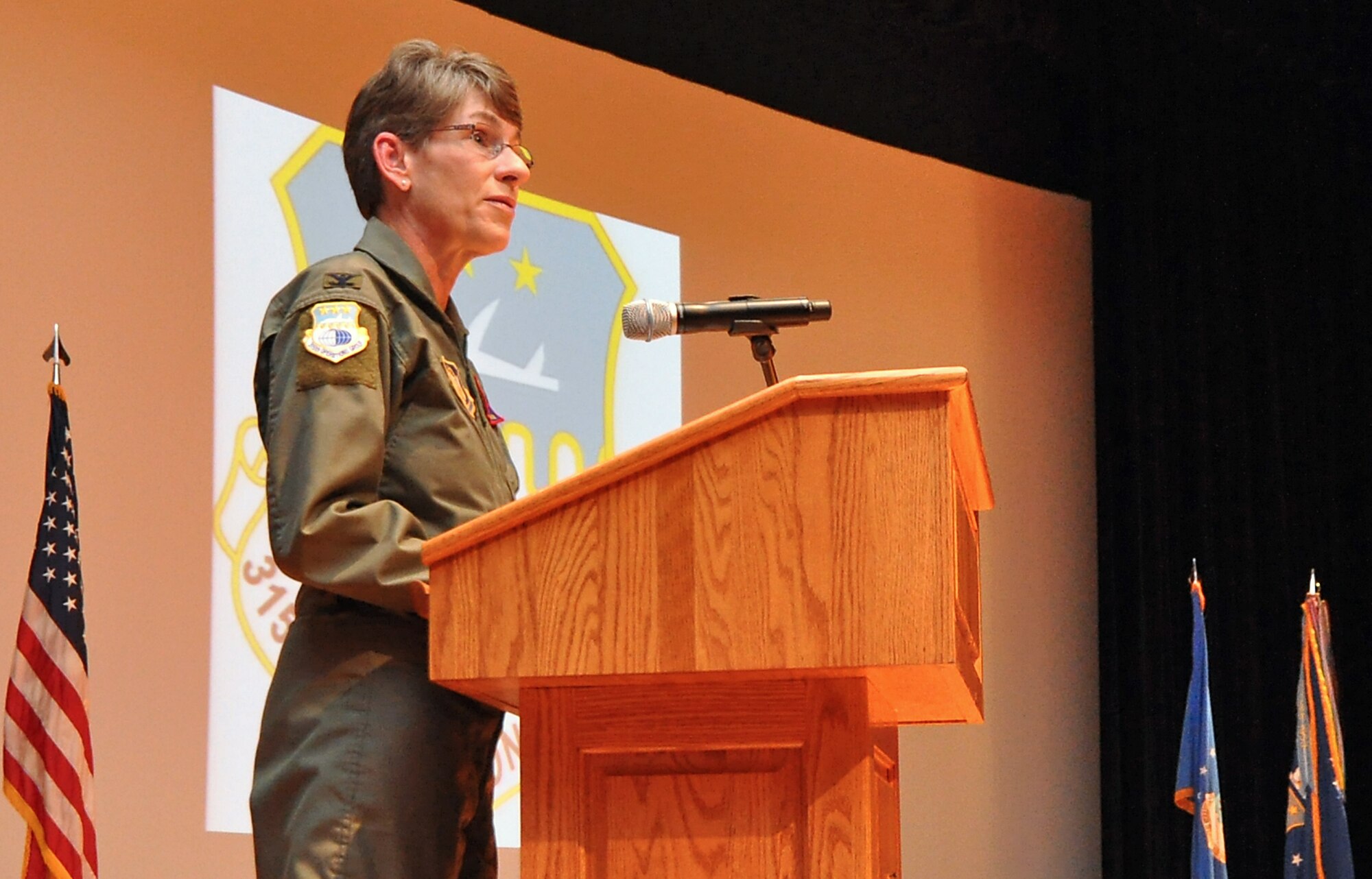 Col. Caroline Evernham, new 315th Operations Group commander, tells of how she has been aware of the impressive reputation of the 315th Airlift Wing for a long time during an assumption of command ceremony at Joint Base Charleston Feb. 21. (U.S. Air Force Reserve photo by Michael Dukes)