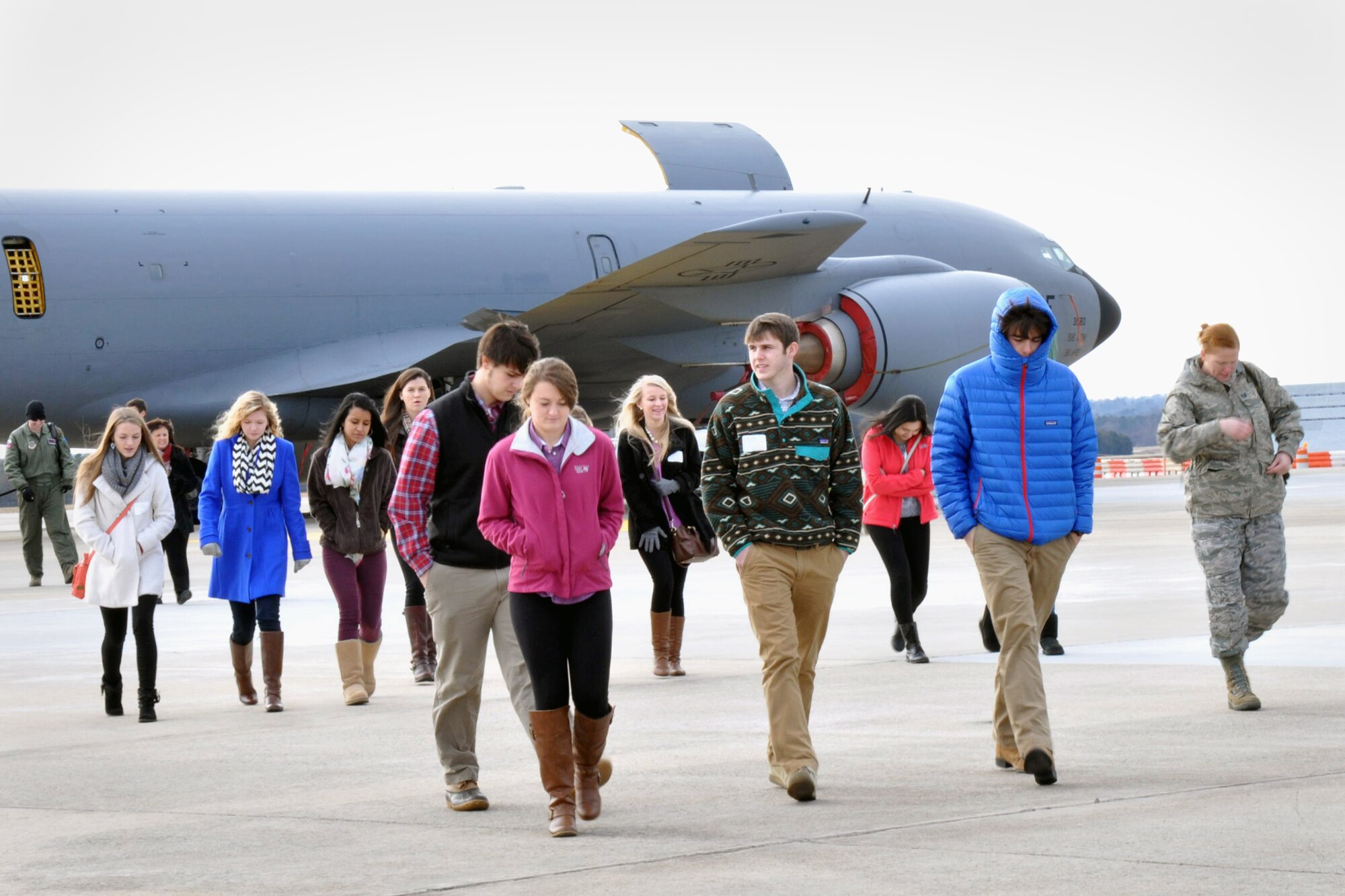 Members of the Wayne County Chamber of Commerce junior leadership program brave the cold after viewing a KC-135R Stratotanker static display during a recent visit to Seymour Johnson Air Force Base. The group members are among the top performing high school juniors in Wayne County. (USAF courtesy photo) 