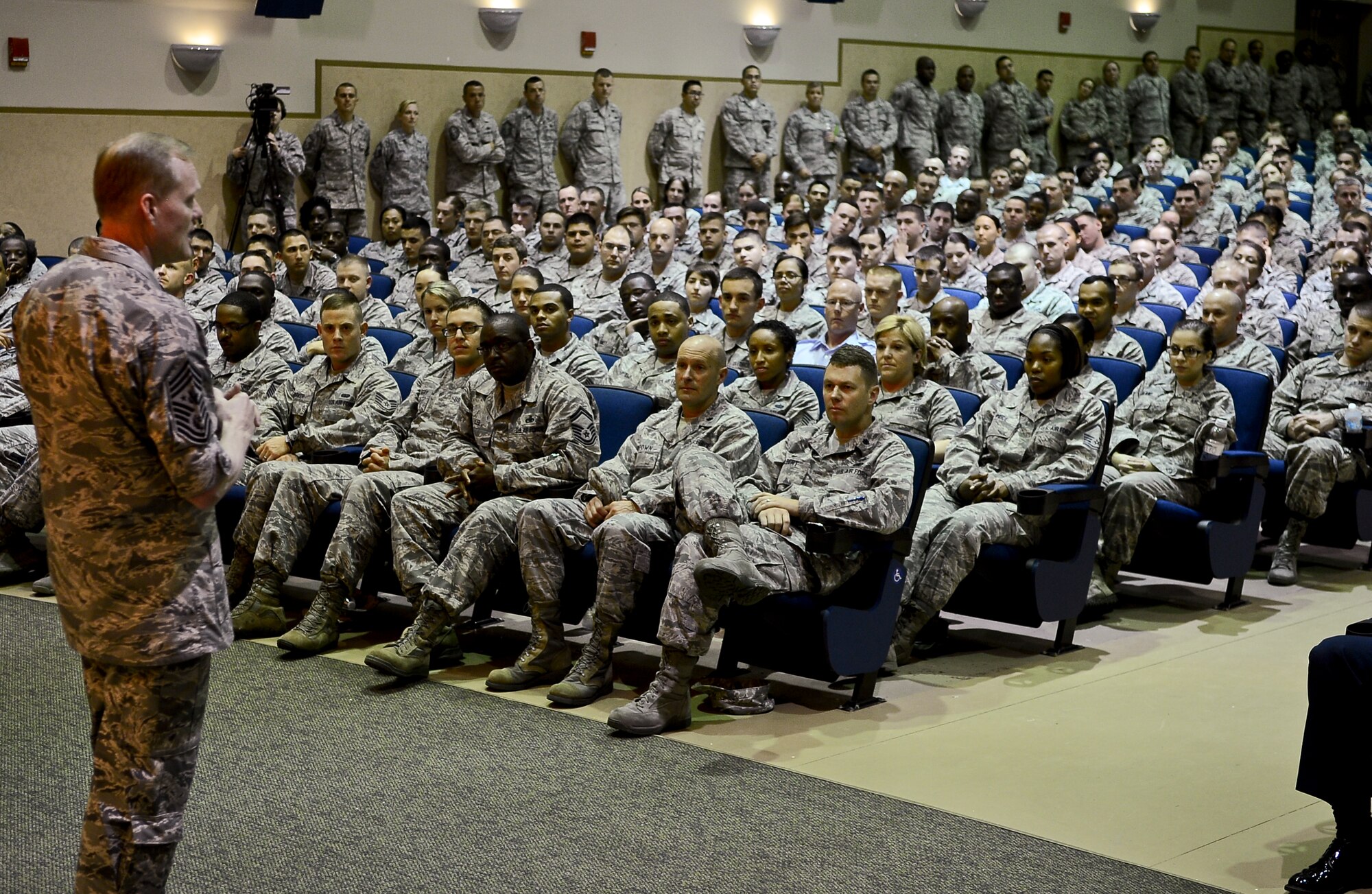 Chief Master Sgt. of the Air Force James A. Cody addresses questions during a base Airmen’s Call at MacDill Air Force Base, Fla., Feb. 20, 2014. Cody toured the base and interacted with Airmen at all levels. He listened to Airmen’s concerns and questions regarding “hot” Air Force topics. (U.S. Air Force photo by Senior Airman Melanie Bulow-Gonterman)