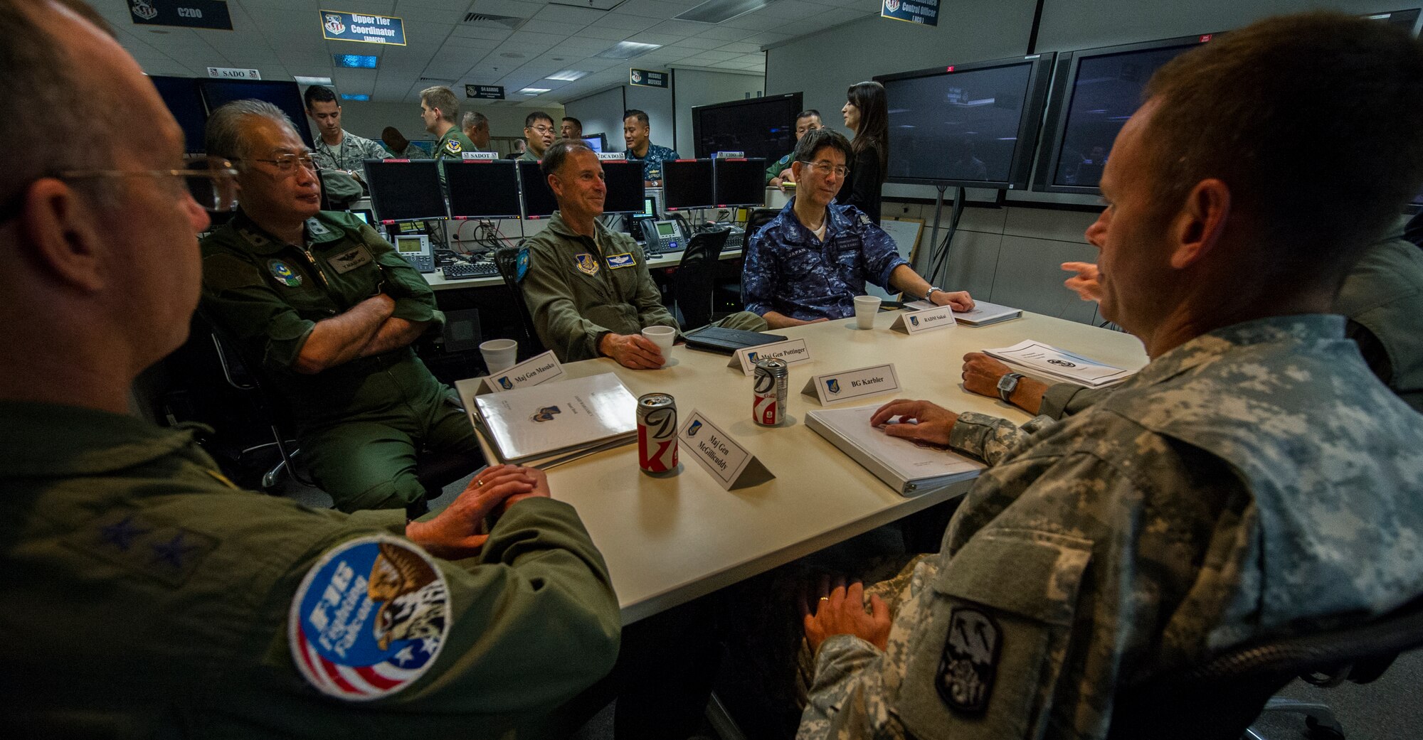 (From left) U.S. Air Force Maj. Gen. Paul McGillicuddy, Pacific Air Forces chief of staff, Japan Air Self-Defense Force Maj. Gen. Yutaka Masuko, Director of Defense Operations, Plans and Communications Directorate at the Air Defense Command Headquarters, Maj. Gen. Kevin Pottinger, Individual Mobility Augmentee to the Pacific Air Forces vice commander, and Japan Maritime Self-Defense Force Rear Adm. Ryo Sakai, Commander of Escort Flotilla 1 at Self-Defense Fleet, and U.S. Army Brig. Gen. Daniel Karbler, 94th Army Air Missile Defense commanding general, plan together during Integrated Air and Missile Defense Wargame V on Feb. 14, 2014, in the 613th Air Operations Center at Joint Base Pearl Harbor Hickam, Hawaii. The exercise provided opportunities to simulate integrated engagements between joint U.S. forces and Japan Self-Defense Forces, while aiming to promote missile defense interoperability. (U.S. Air Force photo by Staff Sgt. Nathan Allen)