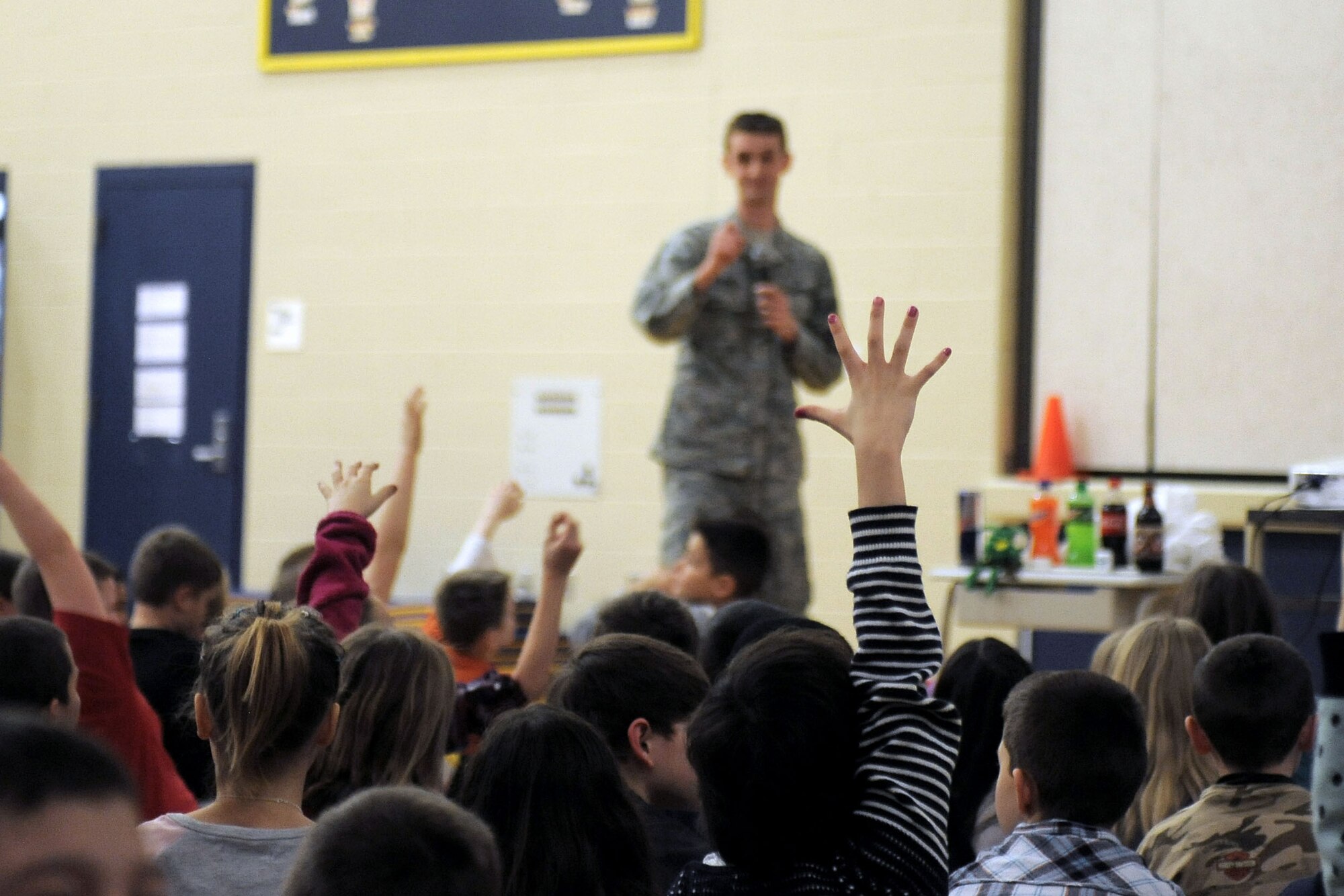 Students of Michael Anderson Elementary School volunteer for a presentation put together by members of the dental clinic at Fairchild Air Force Base, Wash., Feb. 20, 2014. The presentation included examples of how to properly brush and floss. (U.S. Air Force photo by Senior Airman Taylor Curry/Released)