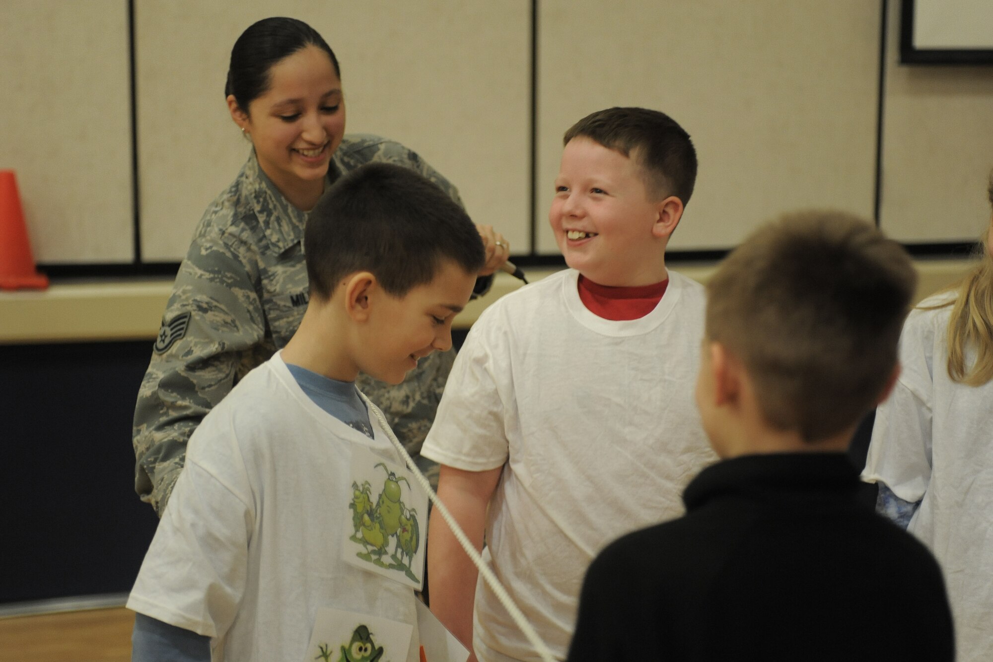 Students of Michael Anderson Elementary School participate in a teeth cleaning exercise hosted by members of the dental clinic at Fairchild Air Force Base, Wash., Feb. 20, 2014. The students learned how to properly brush and floss twice a day and to stay away from high amounts of sugar. (U.S. Air Force photo by Senior Airman Taylor Curry/Released)