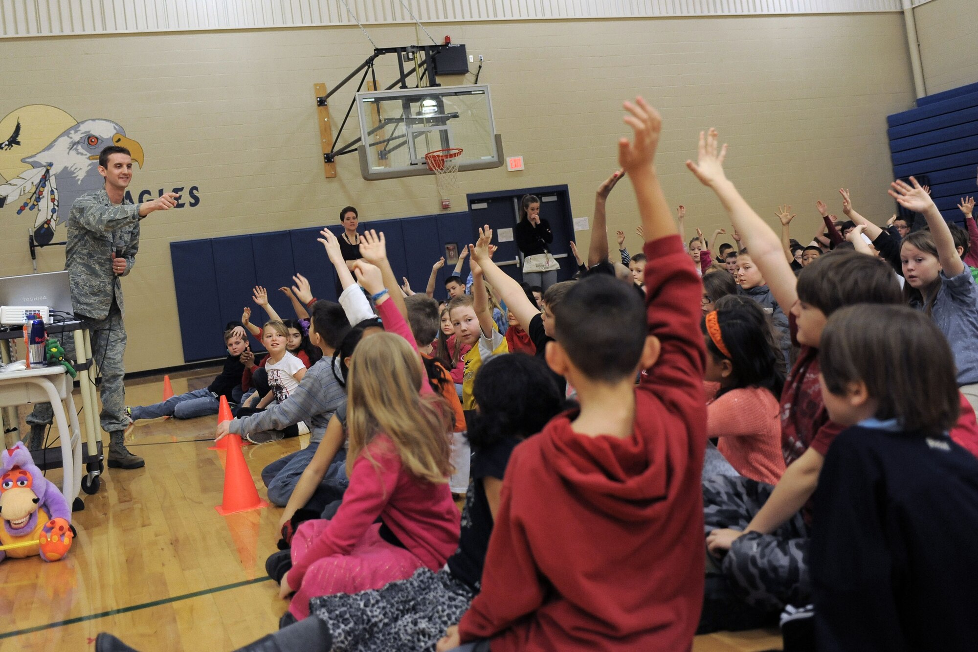 Students of Michael Anderson Elementary School volunteer for a presentation put together by members of the dental clinic at Fairchild Air Force Base, Wash., Feb. 20, 2014. The presentation included examples of how to properly brush and floss. (U.S. Air Force photo by Senior Airman Taylor Curry/Released)
