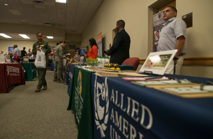 Joint Base Charleston held its annual education fair Feb. 20, 2014, at the Education and Training Center on Joint Base Charleston- Air Base, S.C. More than 130 prospective students attended the fair and were able to get information from 46 different colleges and universities. The fair was open to all military, family members, retirees and DOD civilians. (U.S. Air Force photo/Senior Airman Ashlee Galloway)