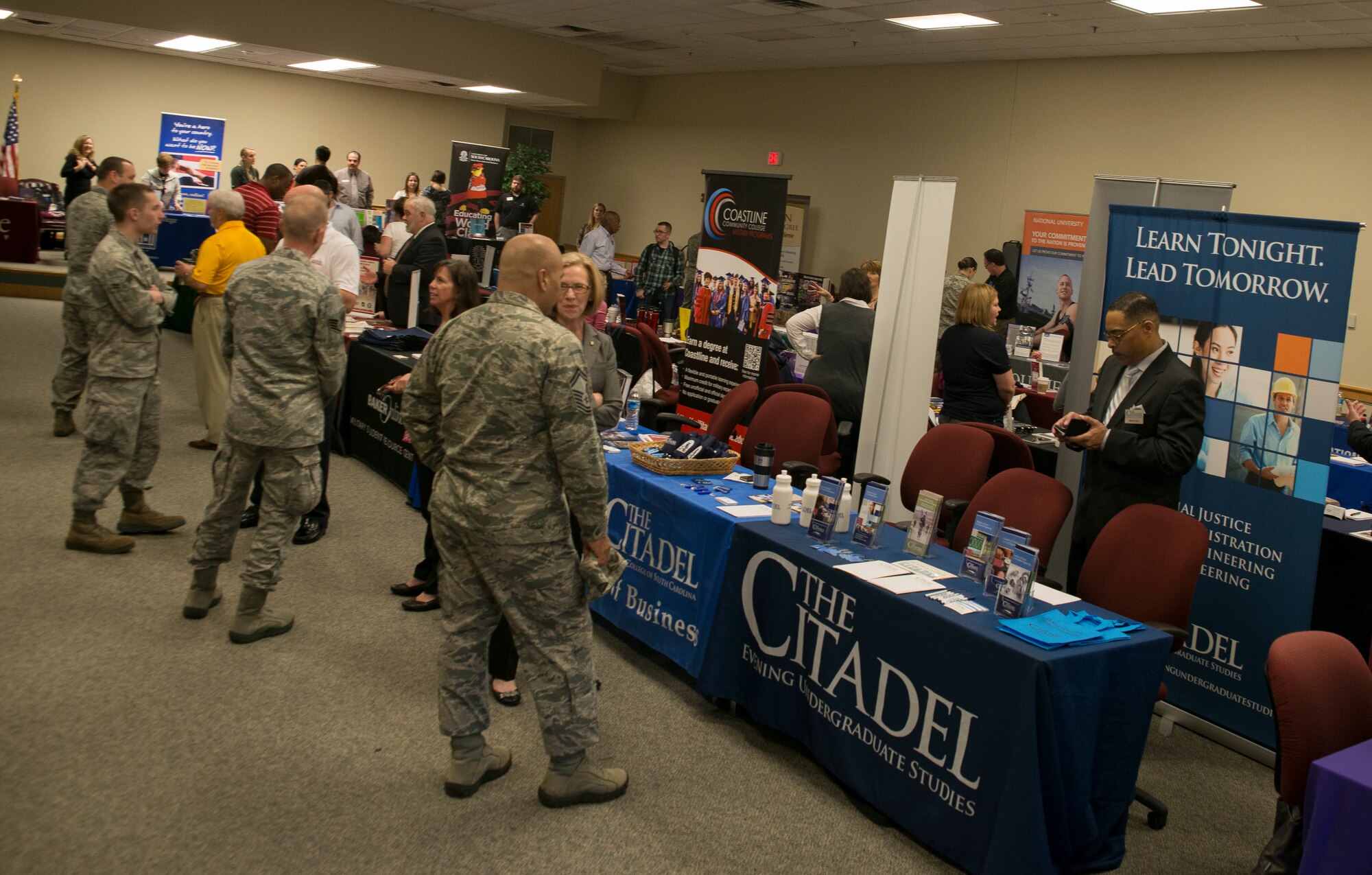 Joint Base Charleston held its annual education fair Feb. 20, 2014, at the Education and Training Center on Joint Base Charleston- Air Base, S.C. More than 130 prospective students attended the fair and were able to get information from 46 different colleges and universities. The fair was open to all military, family members, retirees and DOD civilians. (U.S. Air Force photo/Senior Airman Ashlee Galloway)