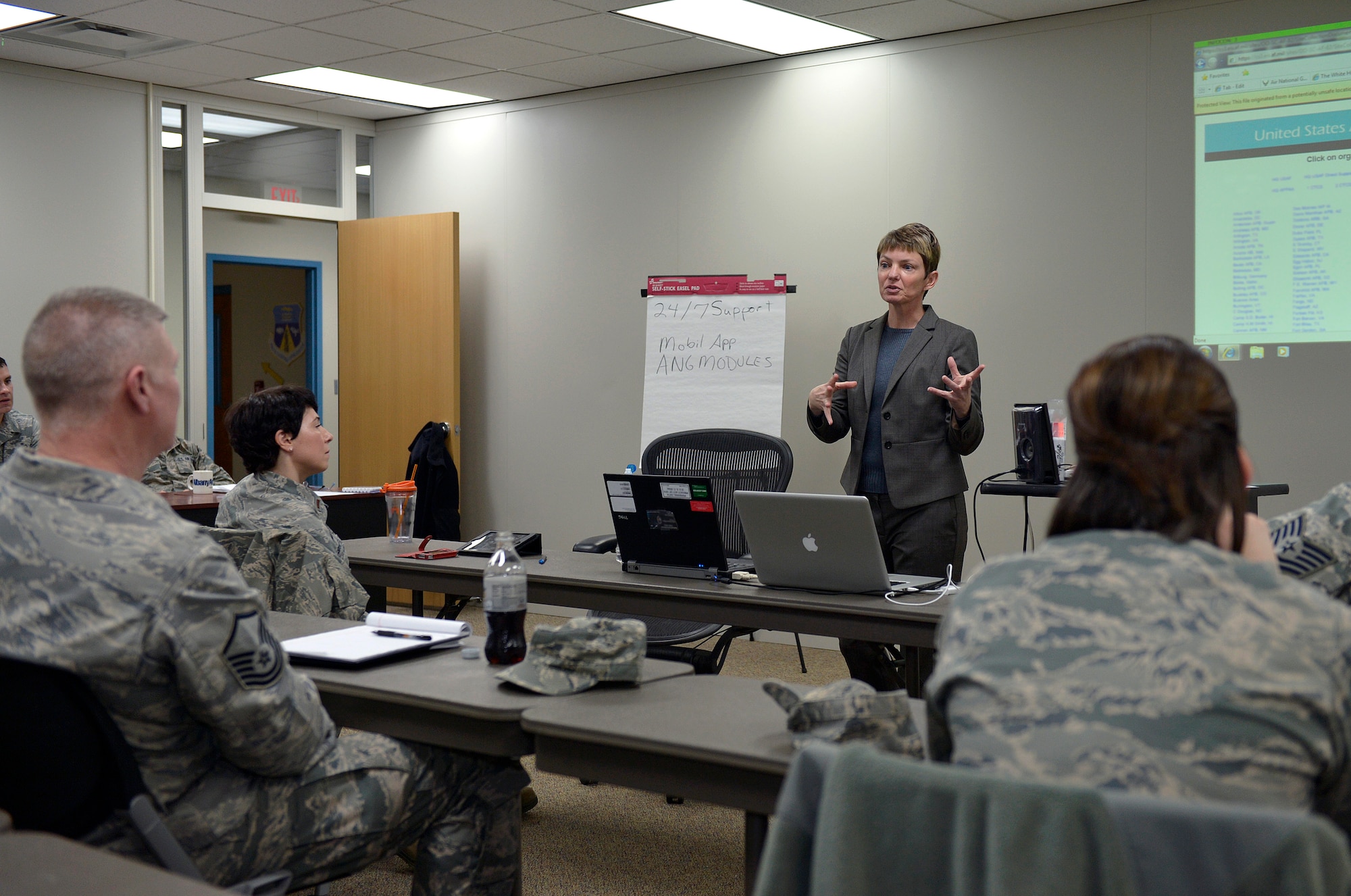 MCGHEE TYSON AIR NATIONAL GUARD BASE, Tenn. - Guest speaker, Charlotte Hu, public web chief for the Air Force Public Affairs Agency in San Antonio, speaks with 18 Airmen in the Public Affairs Managers Seminar here Feb. 10 at the I.G. Brown Training and Education Center. Hu shared her insight and knowledge as the Air Force's leading authority in military web sites and their emergent technology. (U.S. Air National Guard photo by Master Sgt. Kurt Skoglund/Released)