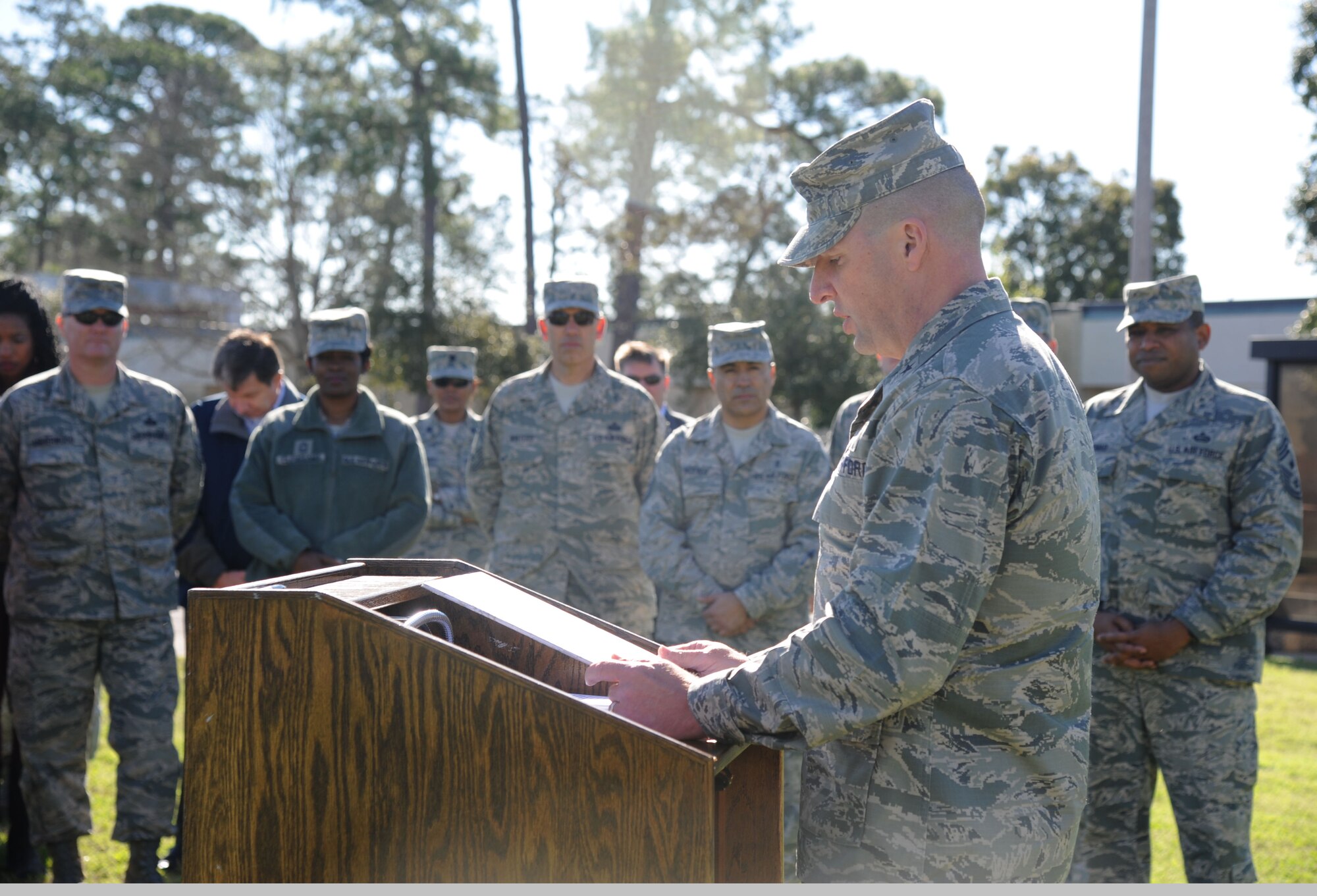 Brig. Gen. Patrick Higby, 81st Training Wing commander, reads the Arbor Day proclamation to a preschool class at the child development center Feb. 21, 2014, at Keesler Air Force Base, Miss., prior to a tree planting ceremony in honor of Arbor Day.  The Tree City USA award was presented to Keesler for the 21st consecutive year for its tree management program.  (U.S. Air Force photo by Kemberly Groue)