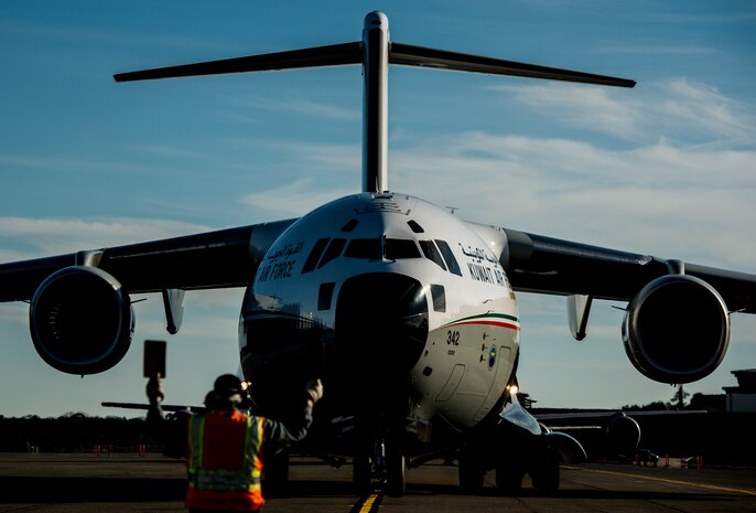 Five members of the Kuwait Air Force transit through Joint Base Charleston – Air Base, Feb. 14, 2014, en route to Kuwait, where the will deliver their nation’s first C-17 Globemaster III. The Kuwait Air Force airmen were embedded with 17th Airlift Squadron for the last month, receiving “seasoning” training on the C-17. (U.S. Air Force photo/ Senior Airman Dennis Sloan)