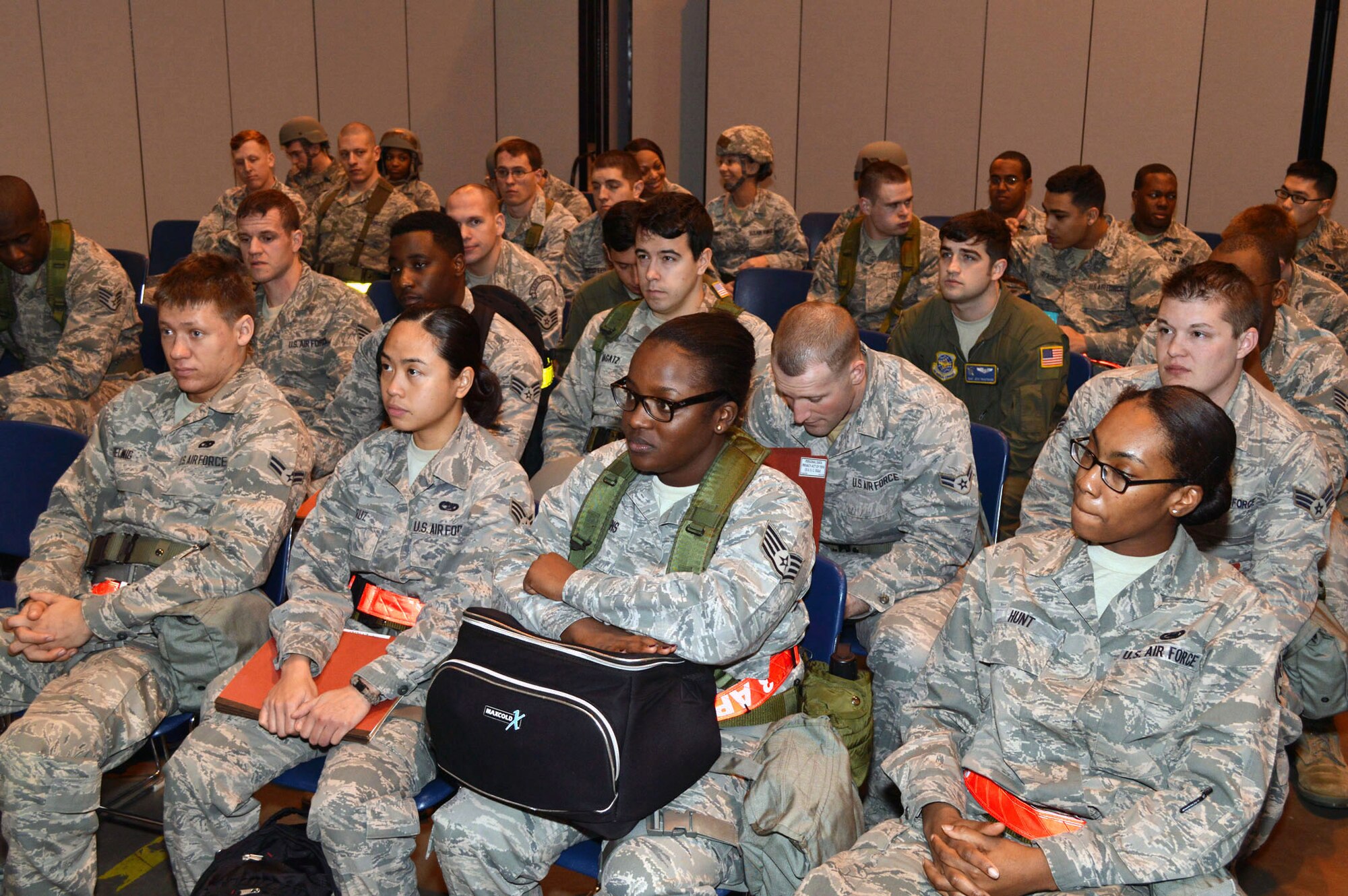 Airmen from the 43d Airlift Group receive a pre-deployment briefing during a mobility exercise here Feb. 20. The four-day exercise prepared 153 personnel and 200 short tons of equipment for deployment. The objectives of the exercise were to assess and evaluate the readiness of the Group, the installation deployment plan, identify process improvement opportunities, command and control, 24-hour operations and fulfill deployment planning and execution requirement to exercise personnel and cargo deployment functions at Pope Army Airfield, Fort Bragg, N.C. (U.S. Air Force photo/Marvin Krause)