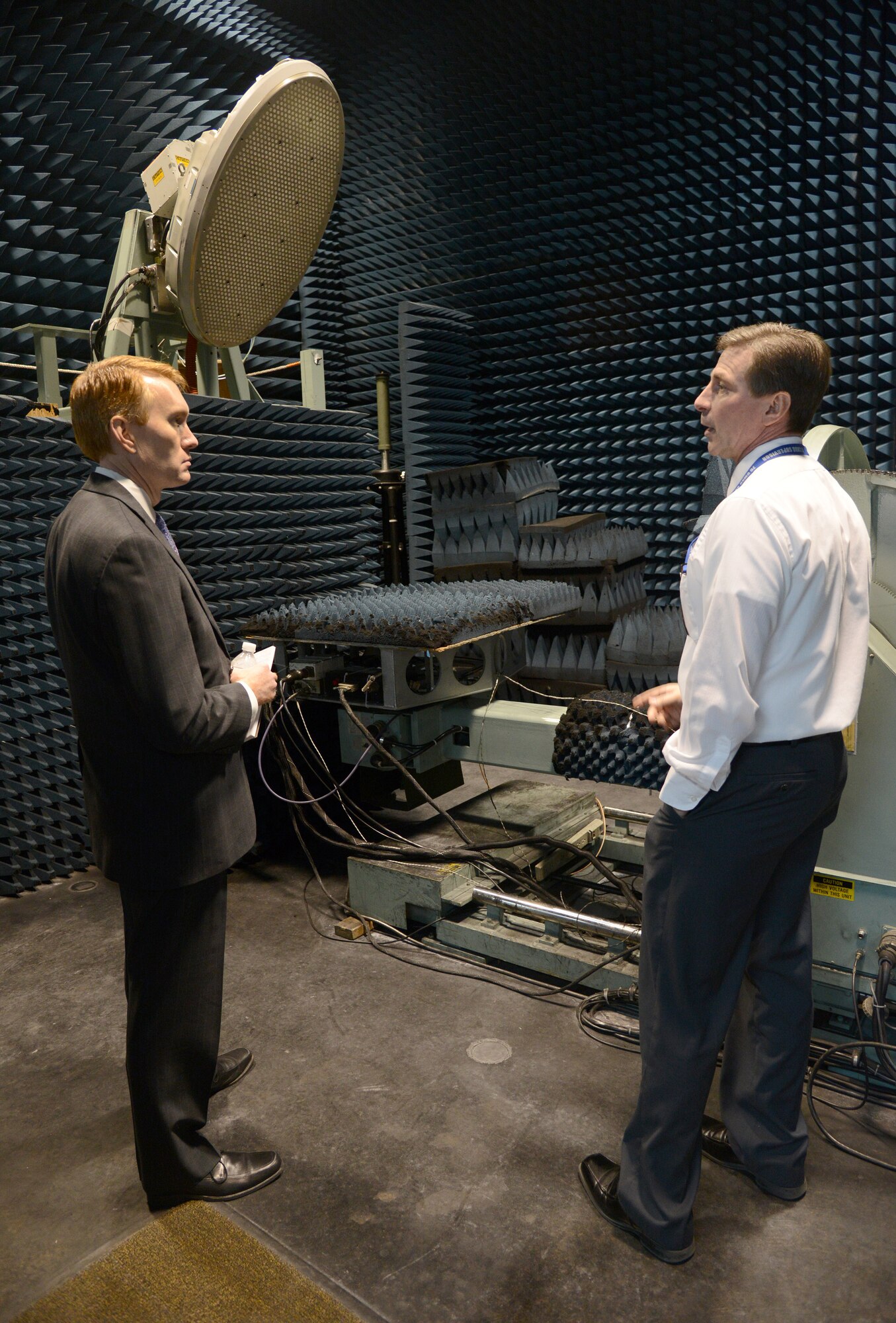 Lee Jones, the Avionics and Electronics Flight chief with the 550th Commodities Maintenance Squadron, right, briefs Congressman James Lankford about the testing and maintenance on the B-1’s Low Observable Antenna during a tour of the B-1 Radar Shop in Bldg. 3761. During a visit to Tinker Feb. 18, the congressman was also briefed on cost-effective readiness strategies and the Diminishing Manufacturing Sources and Material Shortages in the Air Force Obsolescence program. (Air Force photo by Kelly White)