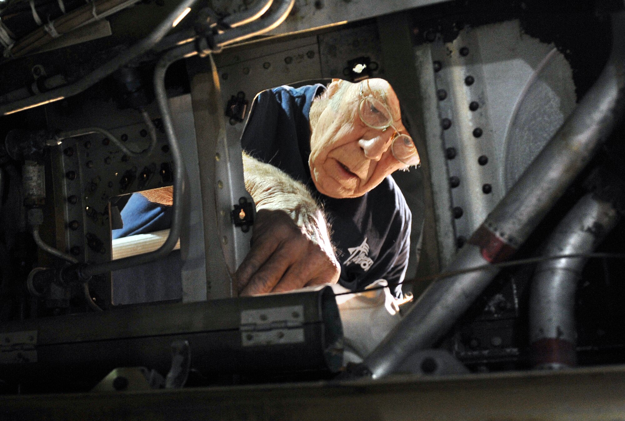 Jay Fullmore, Robins Museum of Aviation, volunteer, performs restorations to an F-100 docked at the museum. The single-engine fighter plane with many corroded structural parts and missing pieces was flown by retired Maj. Gen. Rick Goddard who served as the Warner Robins Air Logistics Center commander from November 1997 to February 2000. (U.S. Air Force Photo by Tommie Horton)