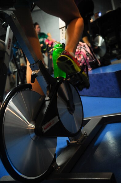 A student cycles during a spin class at the Aderholt Gym on Hurlburt Field, Fla., Feb. 20, 2014. On average, students burn 400 to 600 calories during the 45-minute class, according to Pizzo. (U.S. Air Force photo/Airman 1st Class Andrea Posey)
