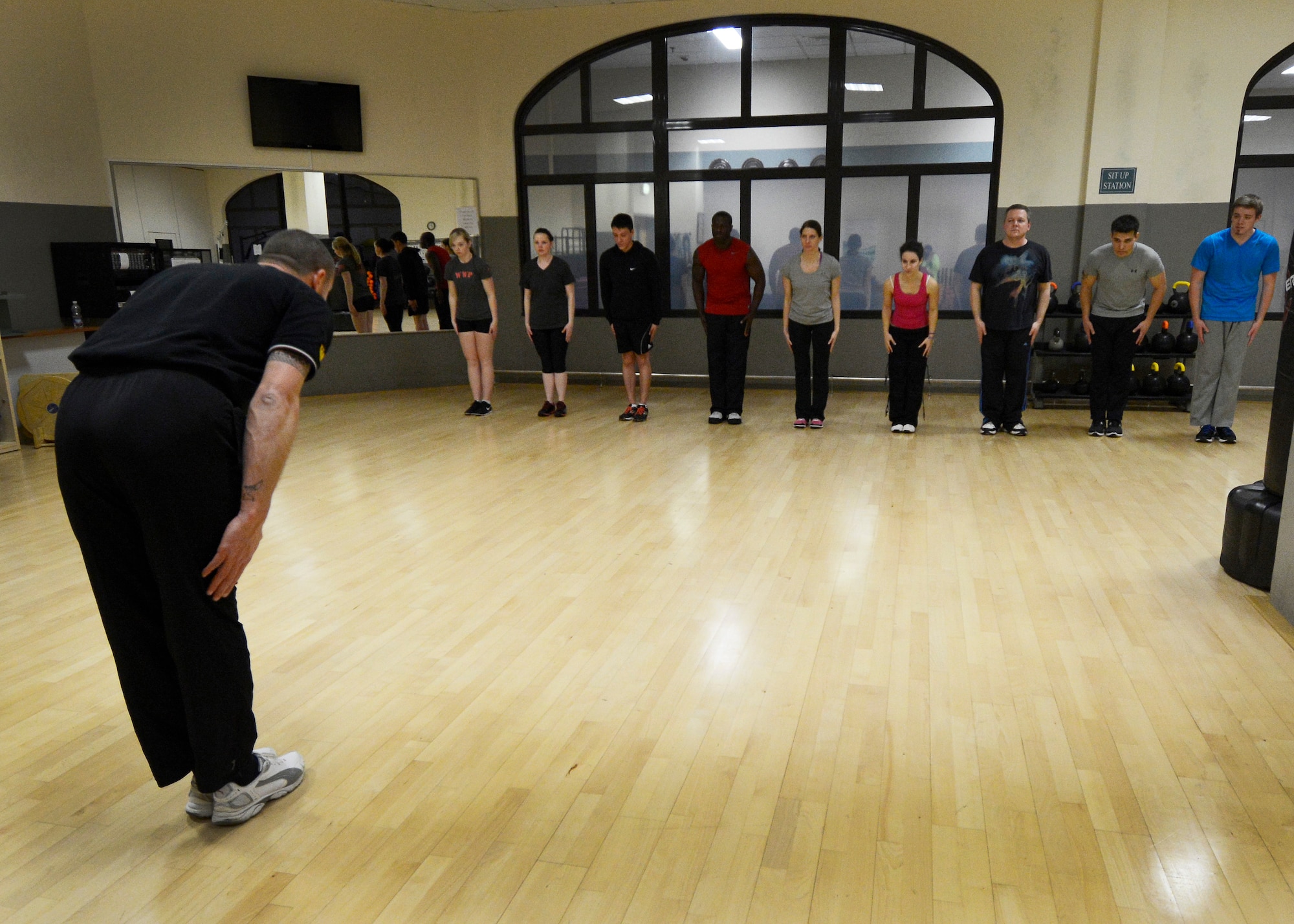 Mauro Vazzoler, Krav Maga instructor, bows to his students at the end of class, Feb. 19, 2014, at the Dragon Fitness Center on Aviano Air Base, Italy. Krav Maga is used as effective self-defense system, which is used by different military forces and teaches a combination of fighting techniques such as boxing, jiu-jitsu and wrestling. (U.S. Air Force photo/Senior Airman Gina Gonzalez Hernandez)