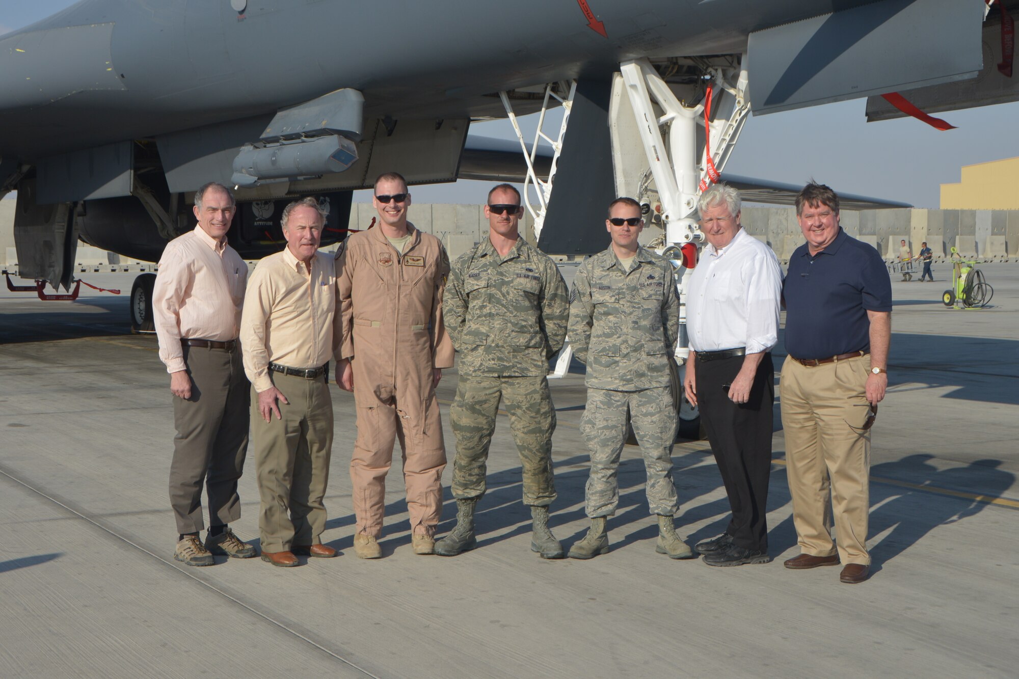 Congressmen Peter Visclosky (D-Ind.), Rodney Frelinghuysen (R-N.J.), James Moran (D-Va.) and Ken Calvert (R-Calif.) from the House of Appropriations Committee pose in front of a B1-B Lancer with Airmen from the 37th Expeditionary Bomb Squadron  at Al Udeid Air Base, Qatar, Feb. 18, 2014. The congressmen visited five Air Force airframes deployed here and were briefed on the capability of multiple units on base who support the U. S. Air Forces Central Command area of responsibility and Operation Enduring Freedom. The congressmen also had lunch with Airmen who are from their represented state to discuss any concerns and thank the service members for their hard work.  (U.S. Air Force photo/Senior Airman Jared Trimarchi)